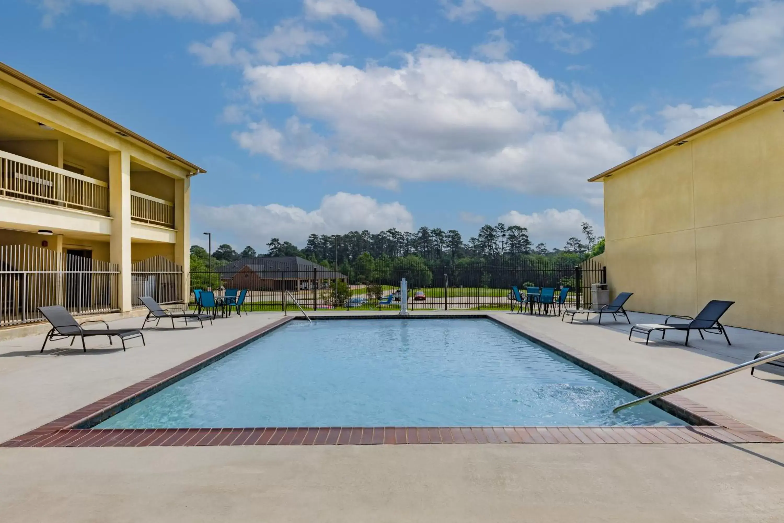 Swimming Pool in Days Inn & Suites by Wyndham Huntsville