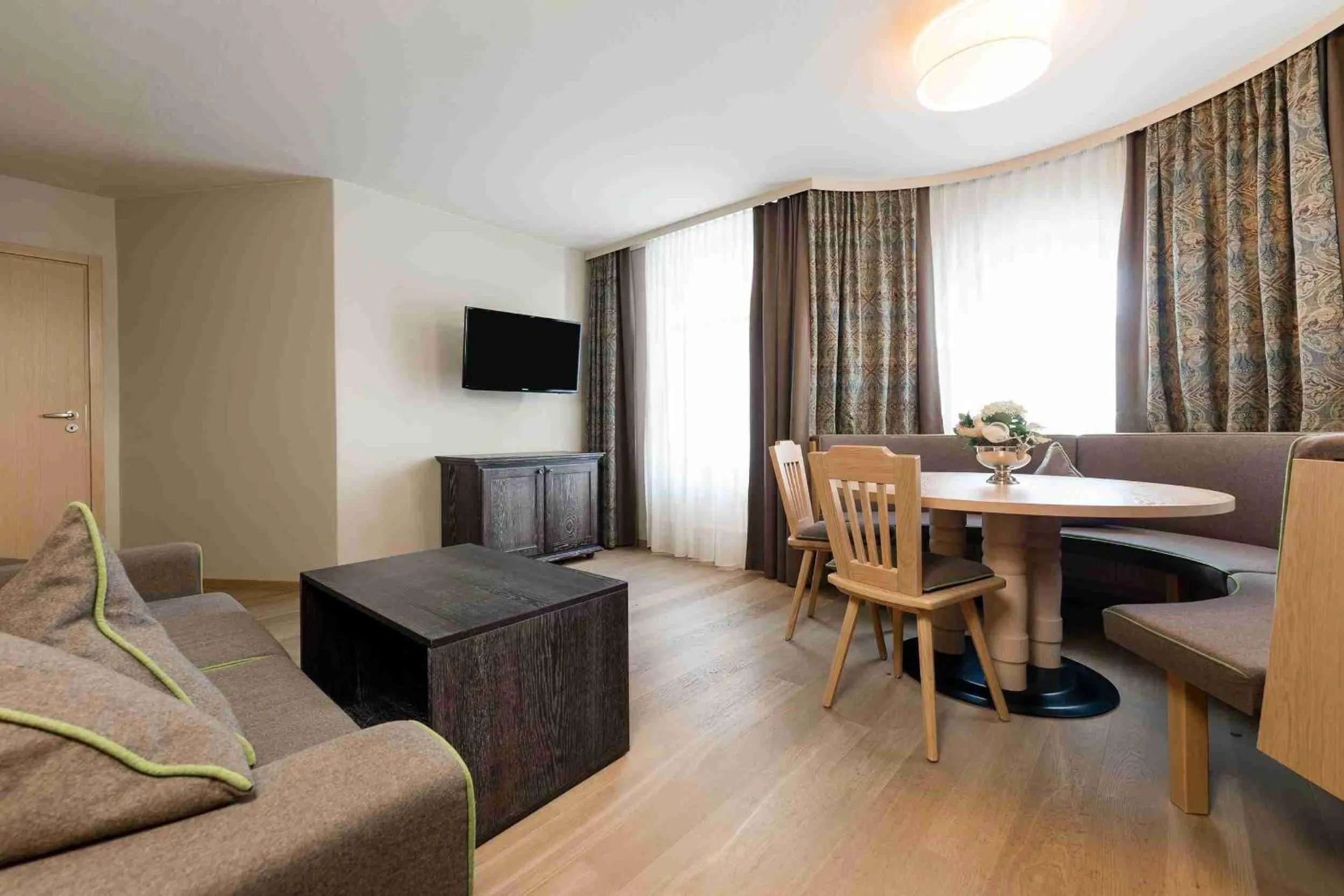 Living room, Bed in Alpeiner - Nature Resort Tirol