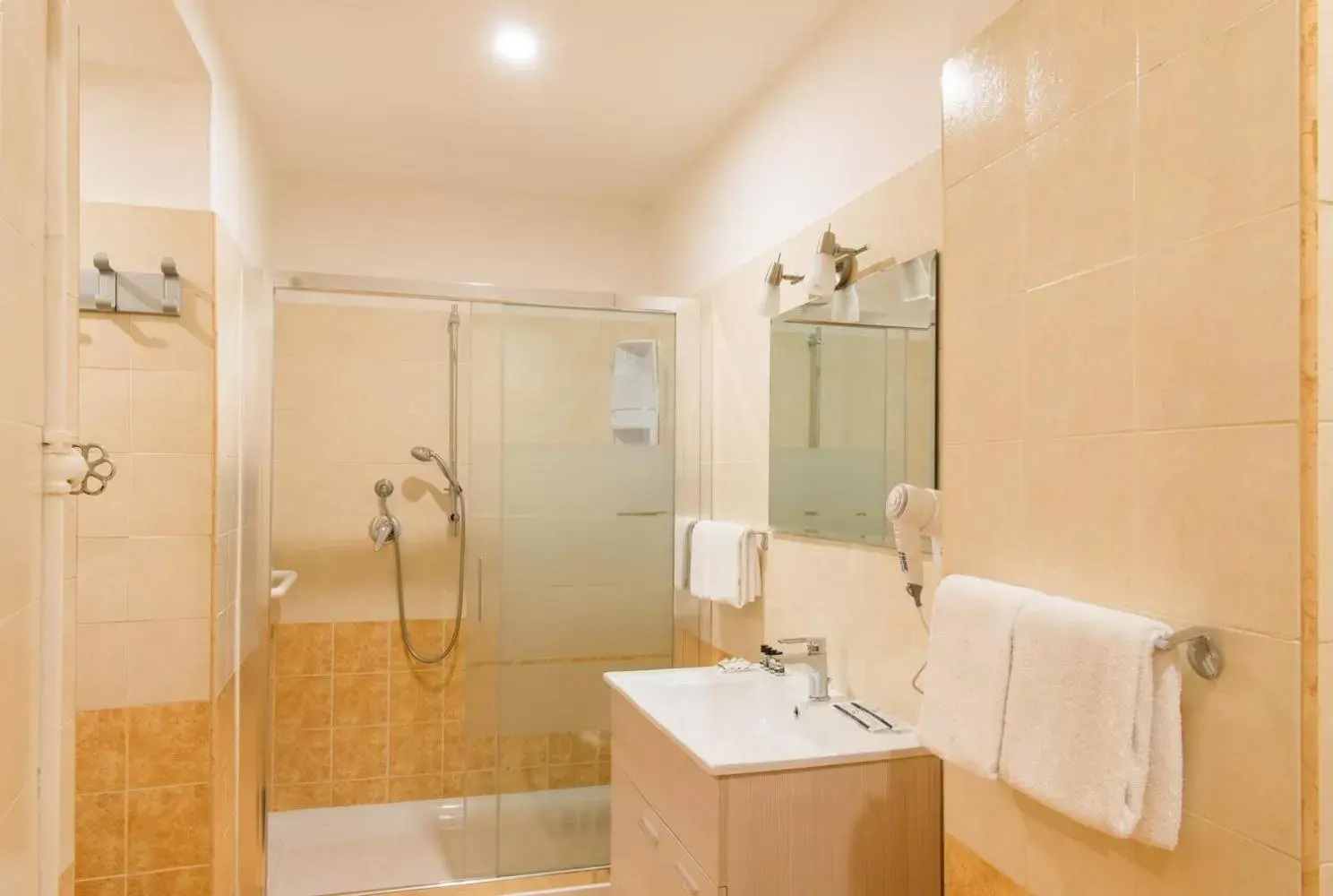 Bathroom in Hotel Alpi Resort