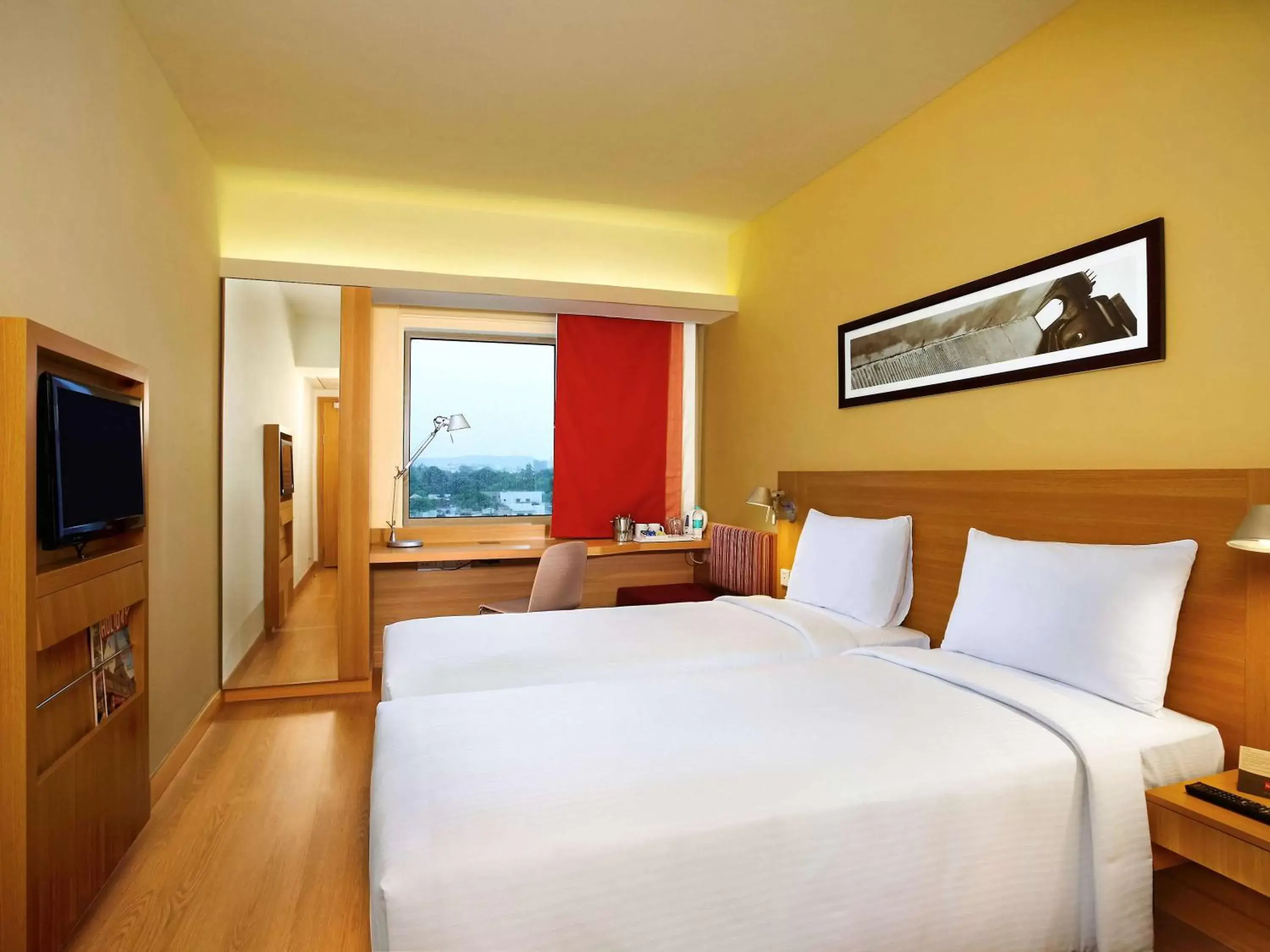 Photo of the whole room, Bed in ibis Hyderabad Hitec City - An Accor Brand