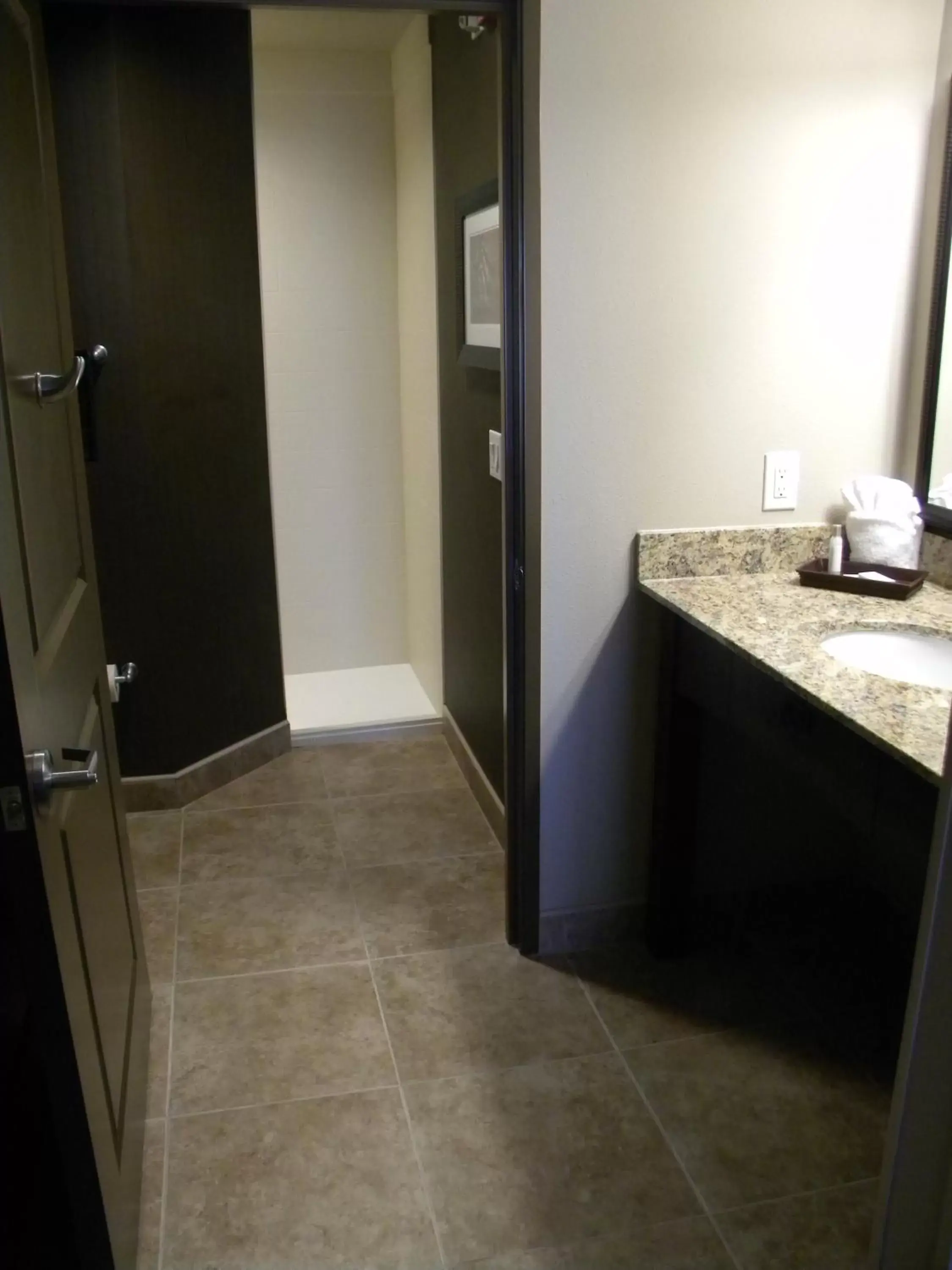 Bathroom in Teddy's Residential Suites Watford City