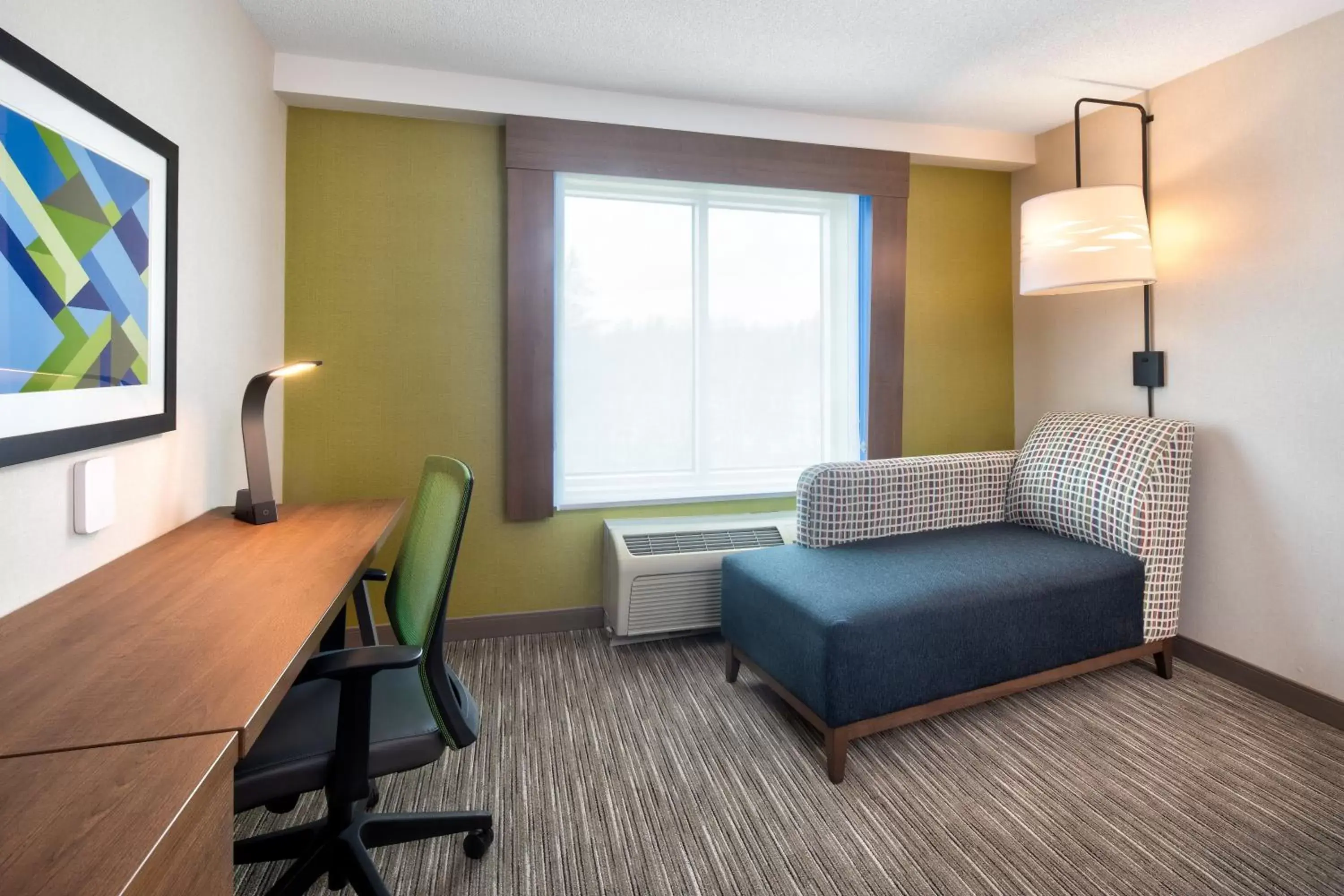 Photo of the whole room, Seating Area in Holiday Inn Express & Suites Halifax Airport, an IHG Hotel