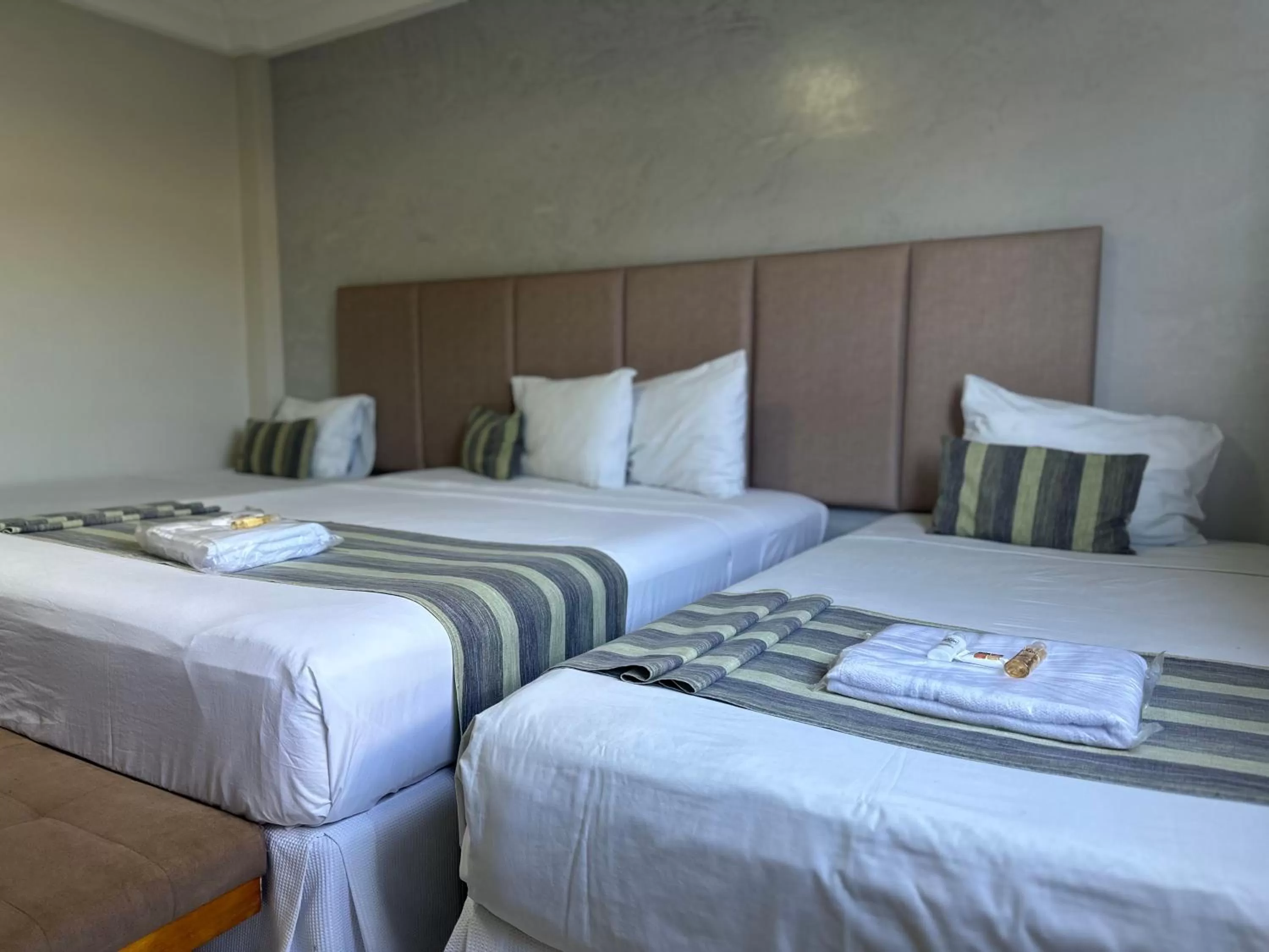 Bed in Atrium Confort Hotels