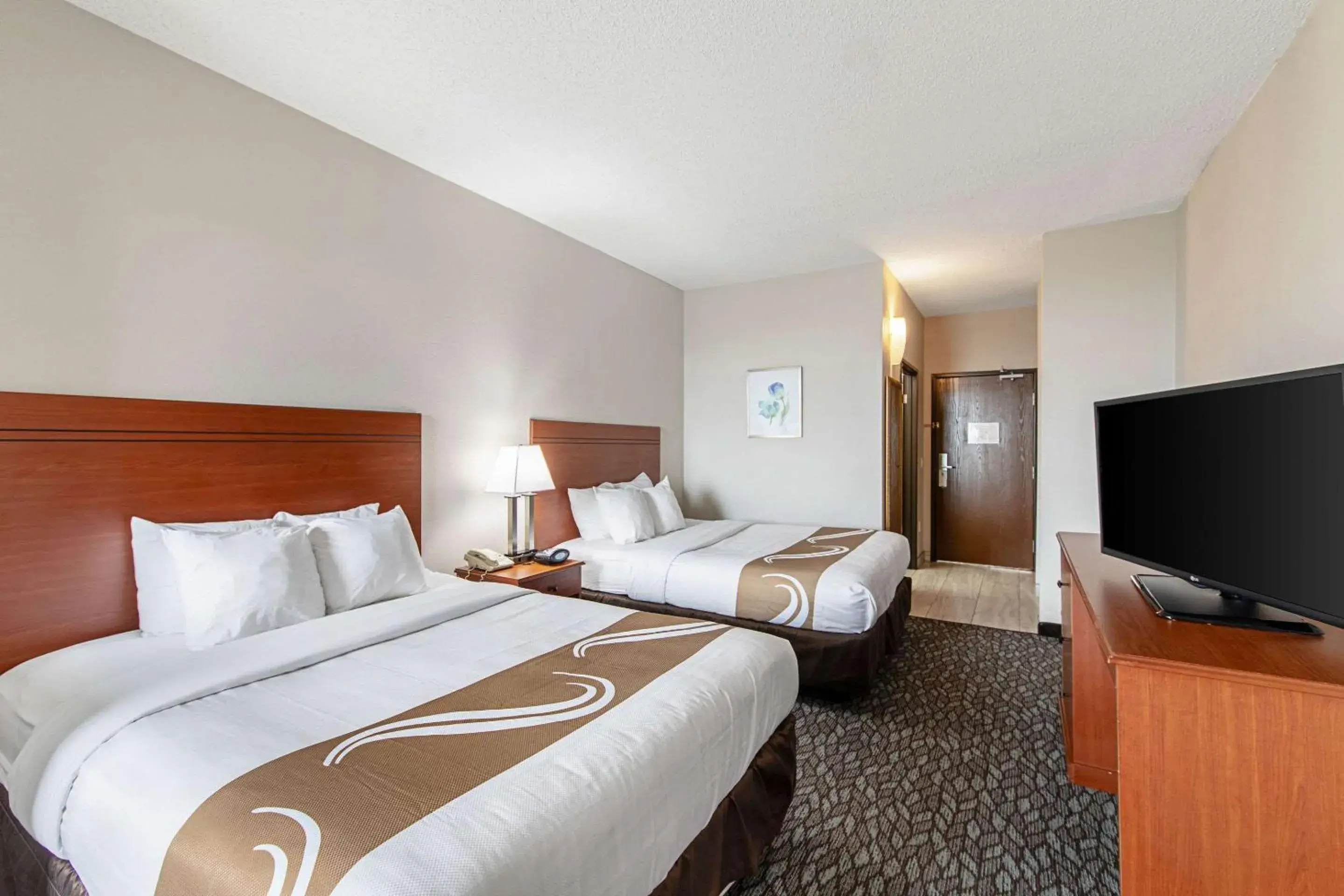 Bedroom, Bed in Quality Suites Austin South Street Elmo District Bedroom, Bed in Quality Suites Austin South Street Elmo District