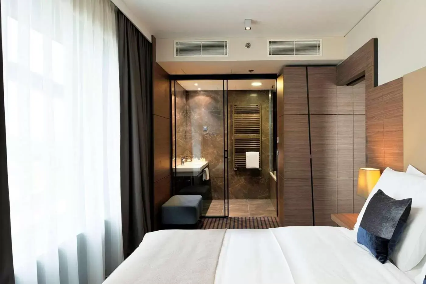Photo of the whole room, Bed in Radisson Blu Plaza Hotel Ljubljana