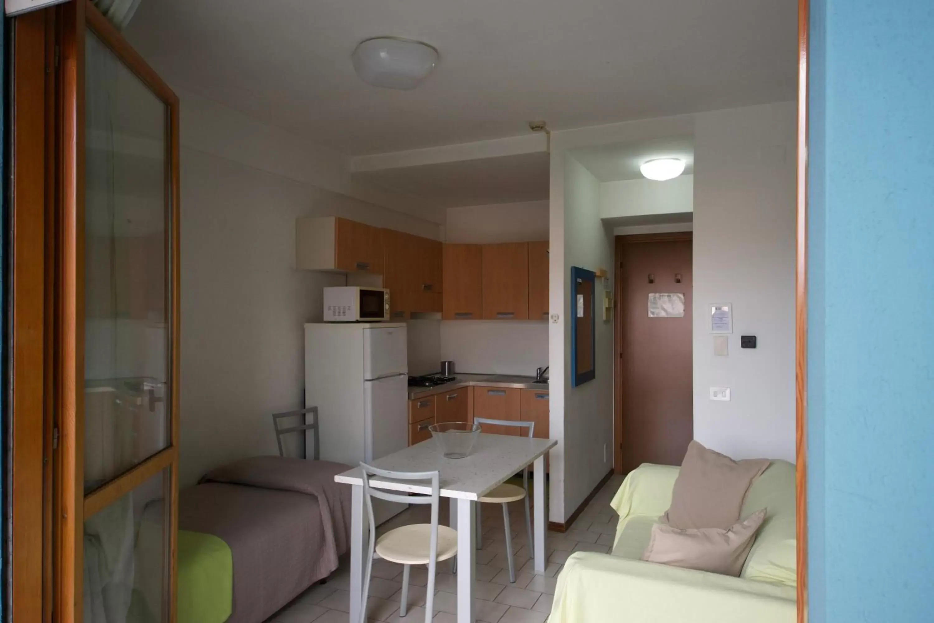 Kitchen or kitchenette, Seating Area in Residence Parmigianino