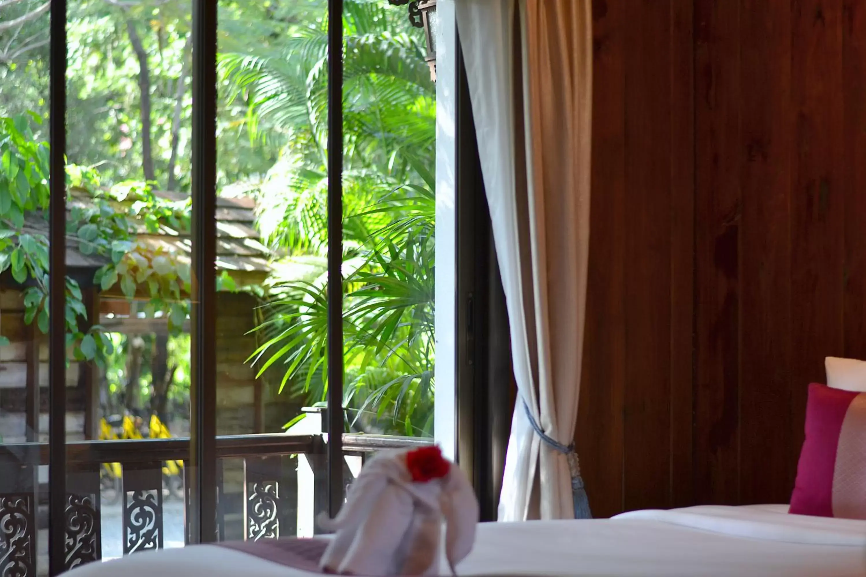 Bed in Thai Thai Sukhothai Resort
