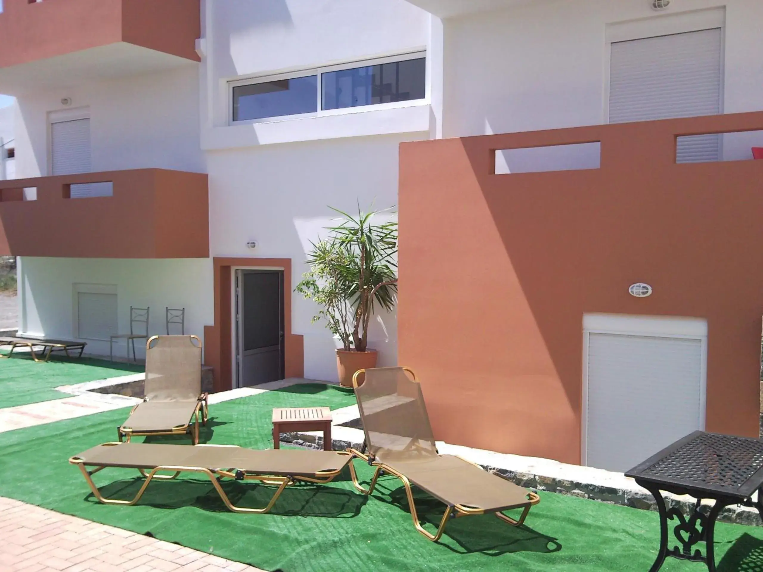 Balcony/Terrace, Swimming Pool in Elounda Sunrise Apartments