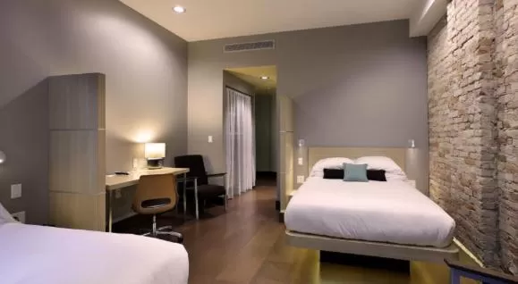 Photo of the whole room, Bed in CityFlatsHotel - Grand Rapids, an Ascend Collection Hotel