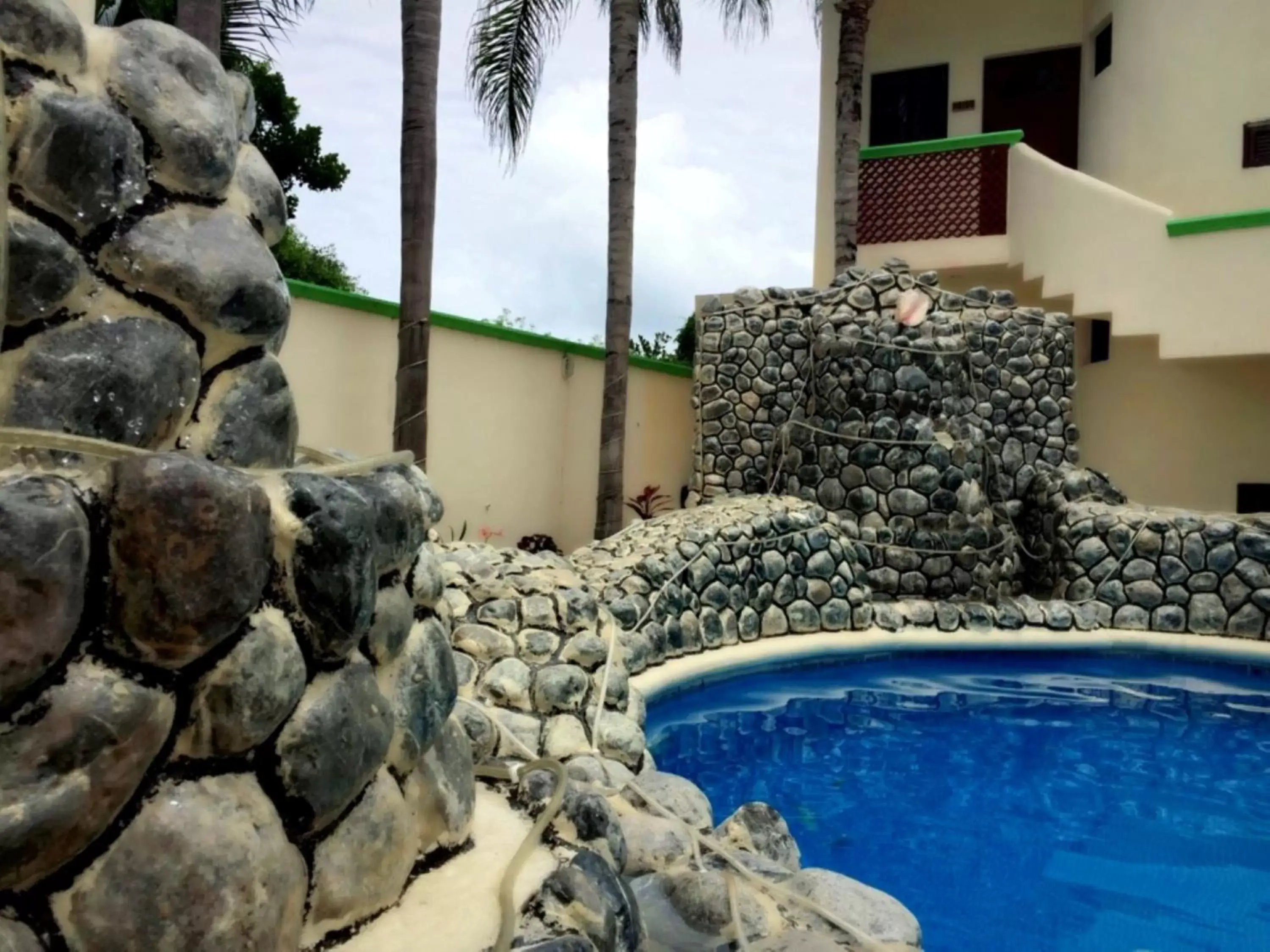 Swimming pool in Villas Coco Resort - All Suites