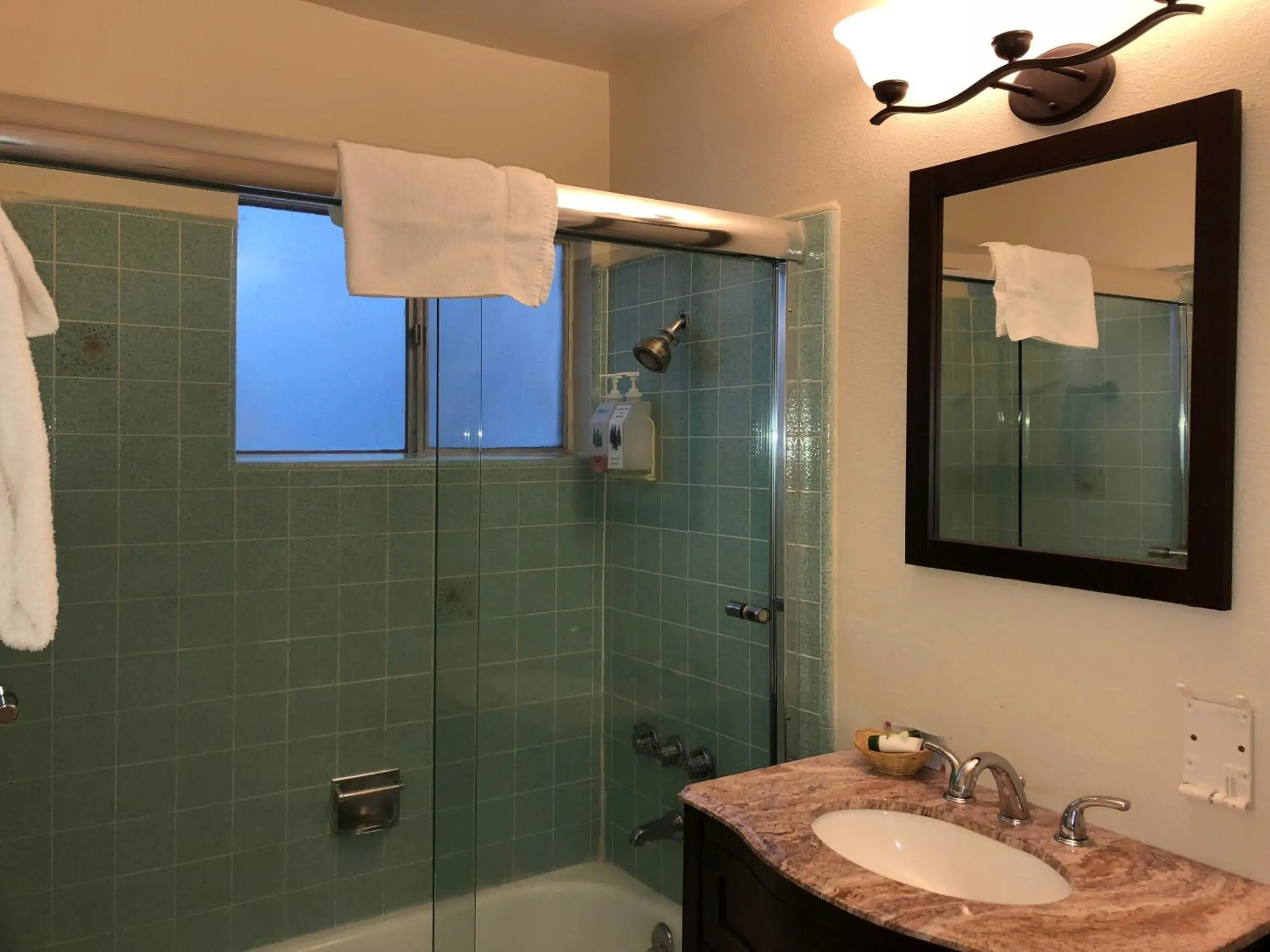 Bathroom in Cedar Inn & Suites