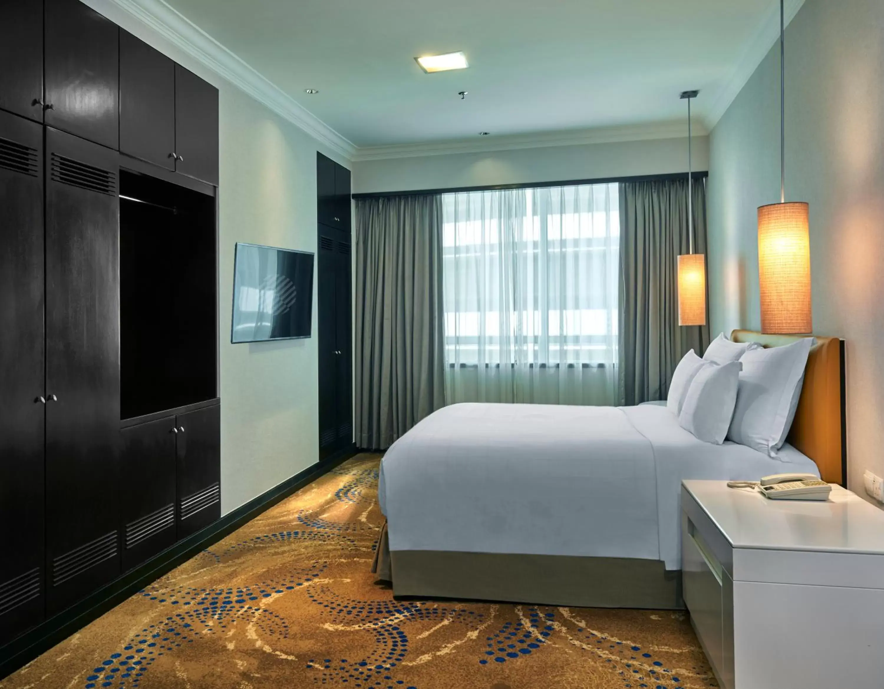 Bed, TV/Entertainment Center in Pullman Kuala Lumpur City Centre Hotel & Residences