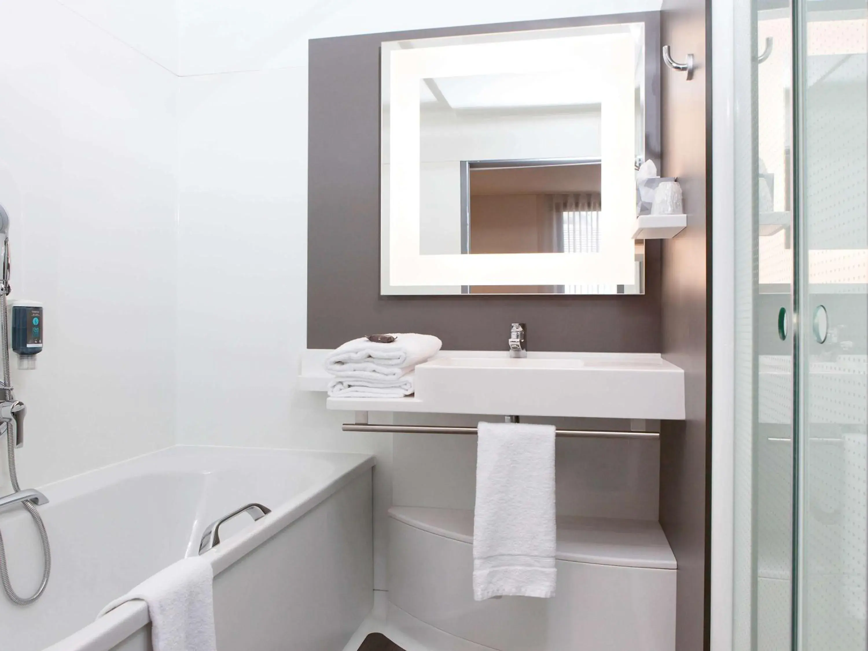 Photo of the whole room, Bathroom in Novotel Suites Paris Stade de France