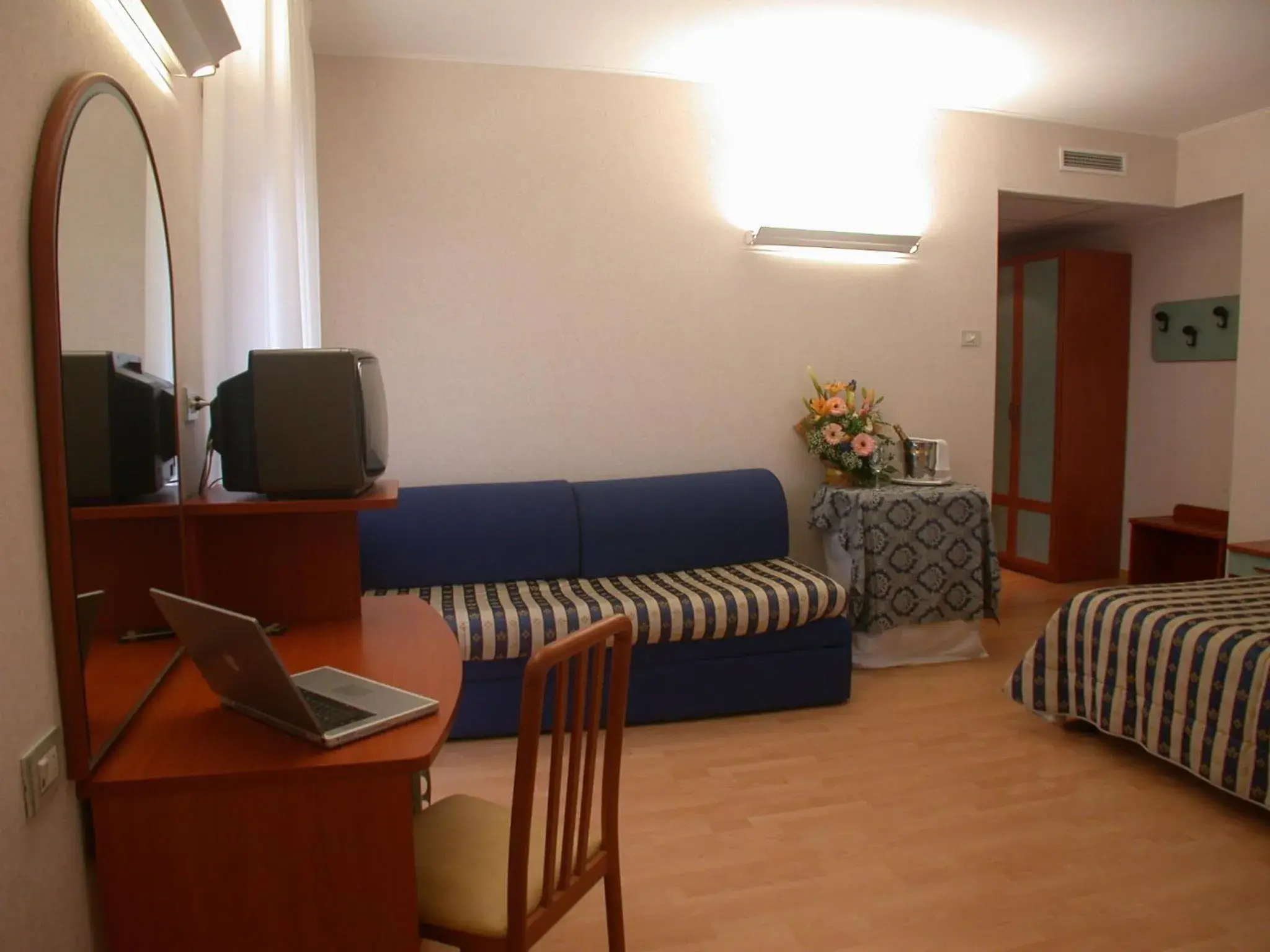 Bedroom, Seating Area in Hotel La Pergola