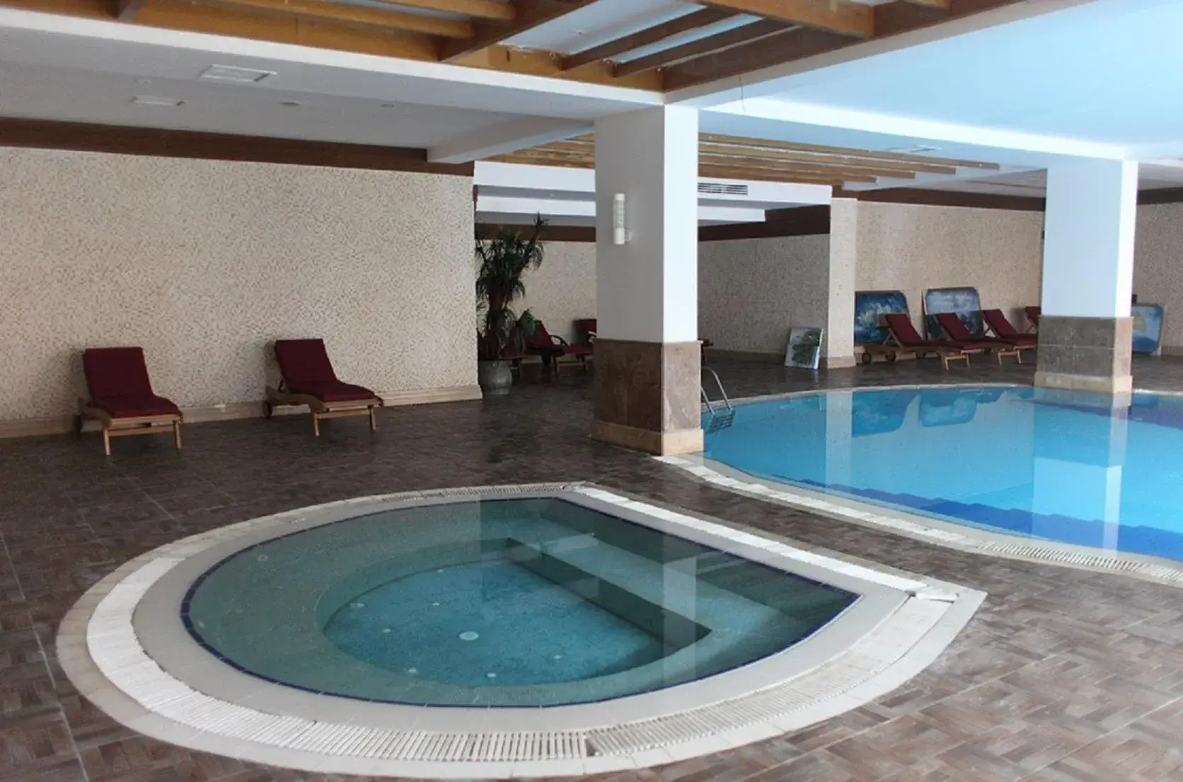 Swimming Pool in Crystal Aura Beach Resort & Spa