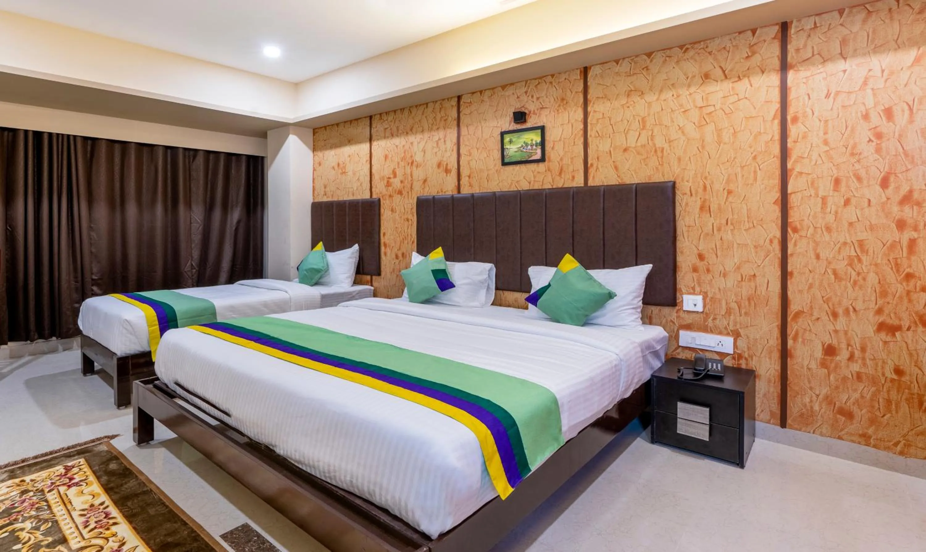 Bed in Treebo Trend D Grand