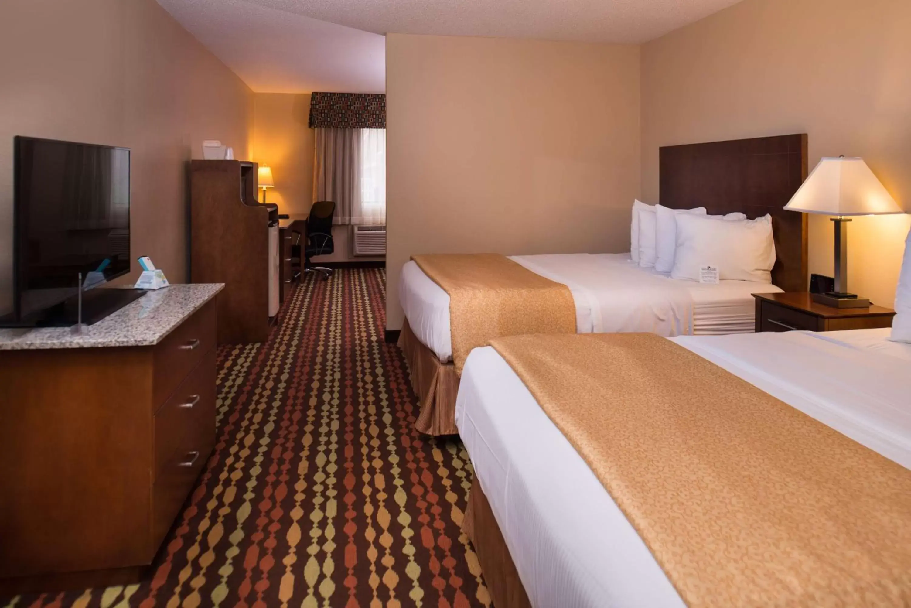 King Room with One King Bed and Two Queen Beds - Non-Smoking in Best Western Ambassador Inn & Suites