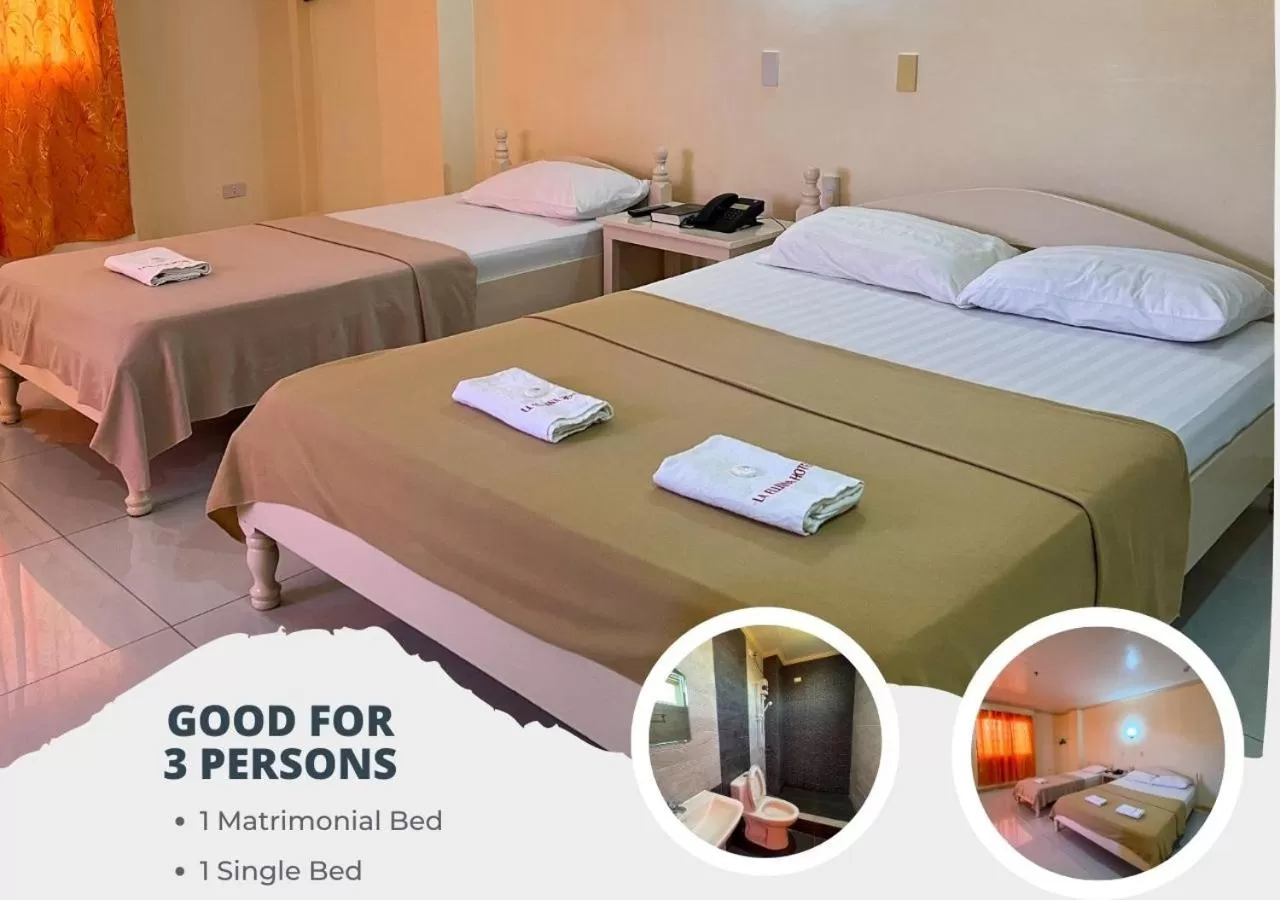 Bed in La Elliana Hotel & Restaurant, Inc.