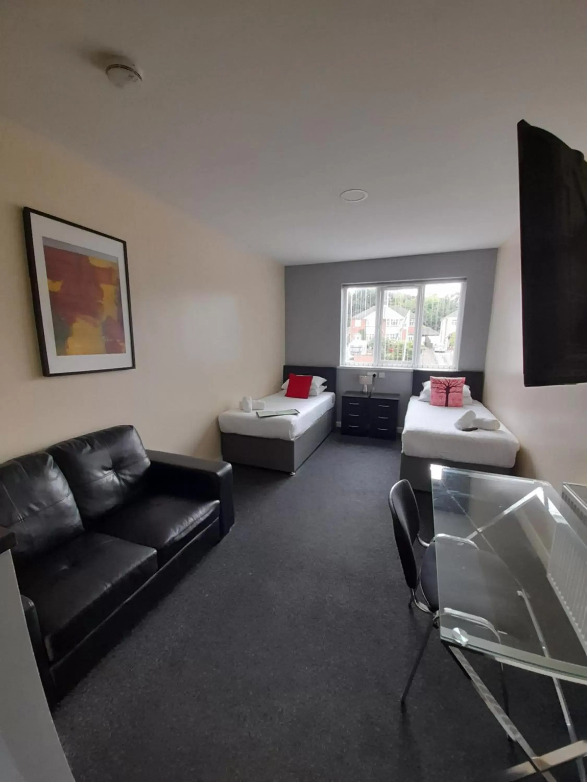 Bedroom, Seating Area in Lymedale Suites Studios & Aparthotel in NEWCASTLE UNDER LYME & STOKE