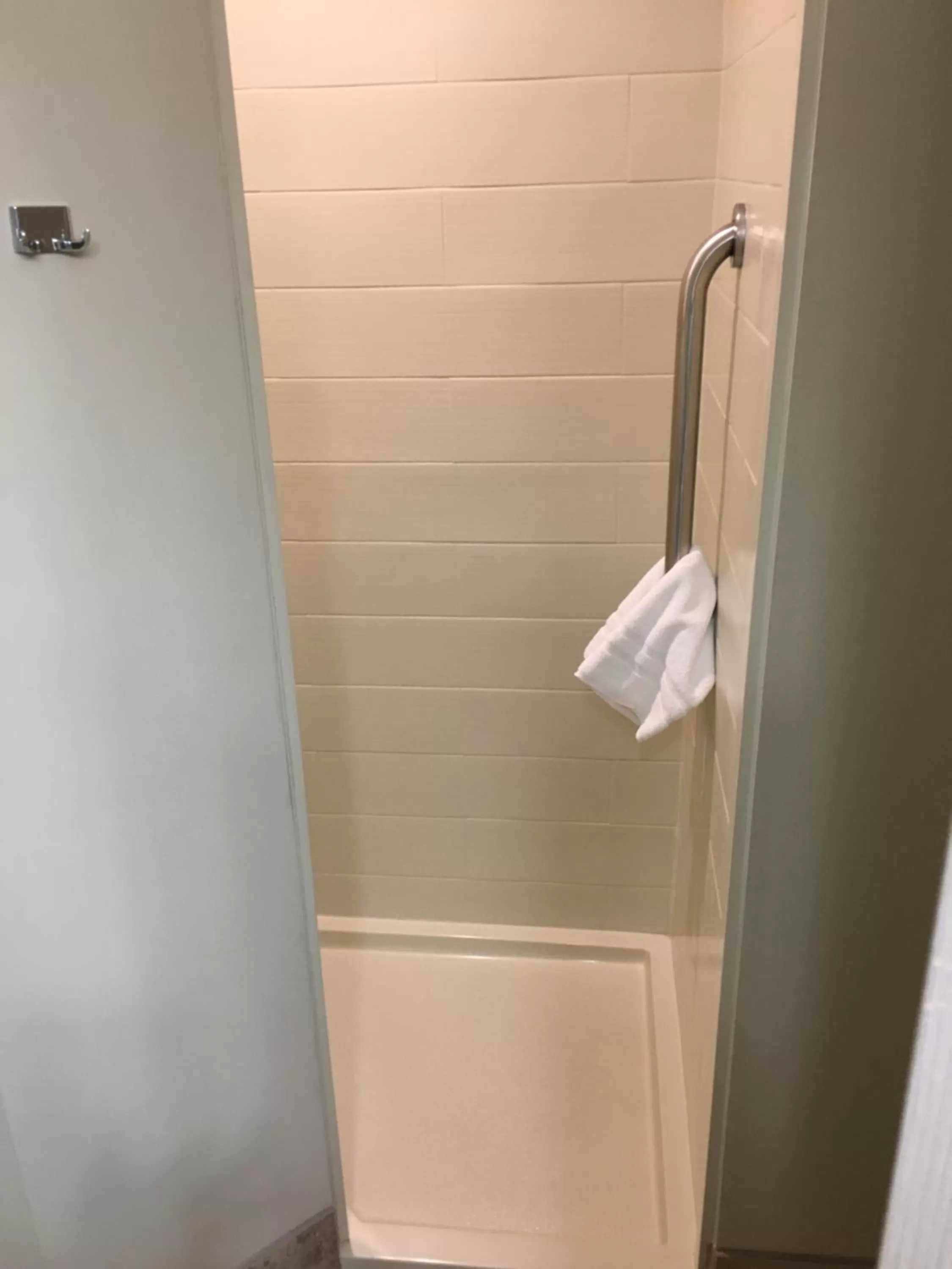 Shower in AmericInn by Wyndham Fairfield
