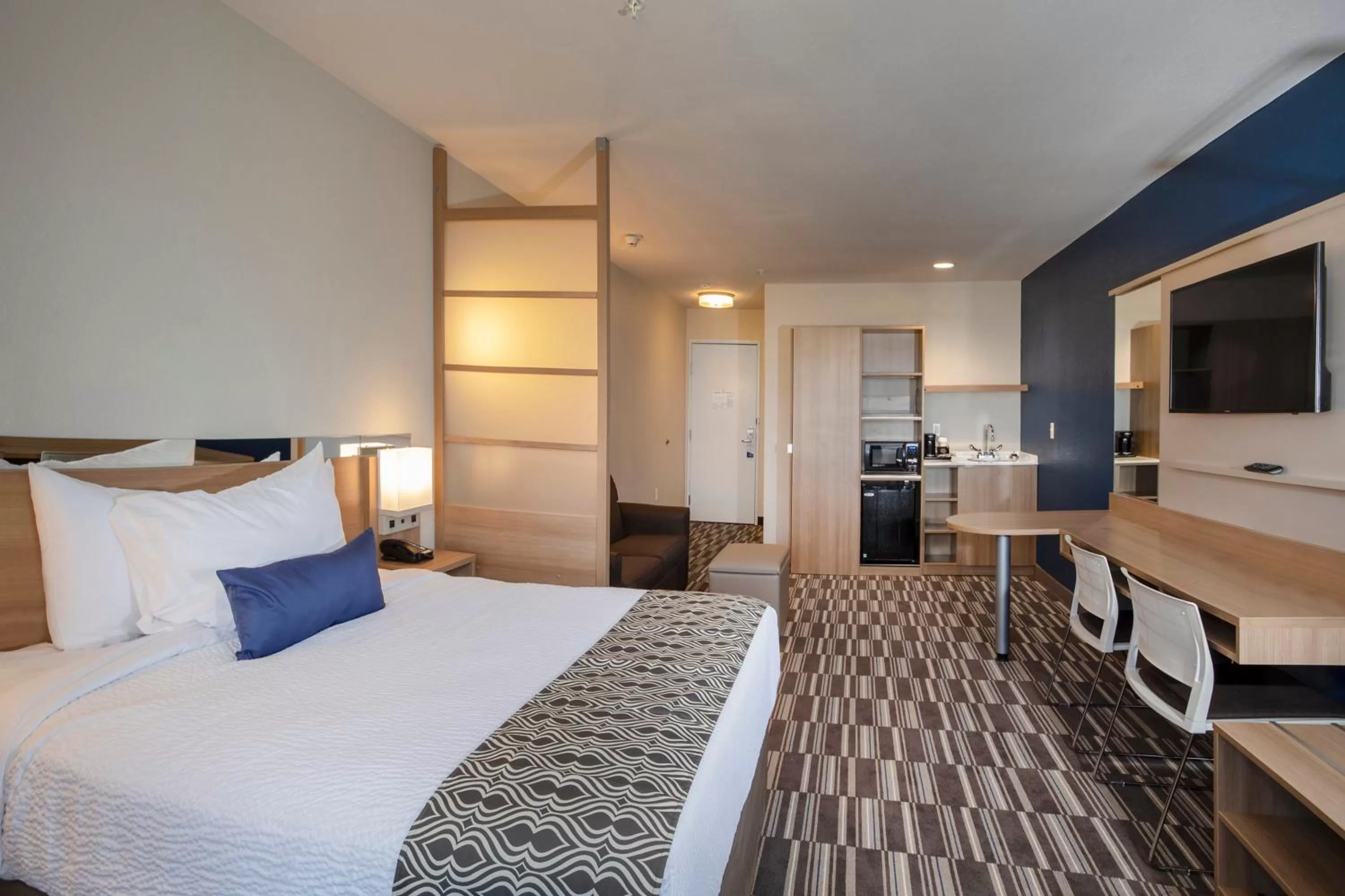 Bed in Microtel Inn & Suites by Wyndham Loveland