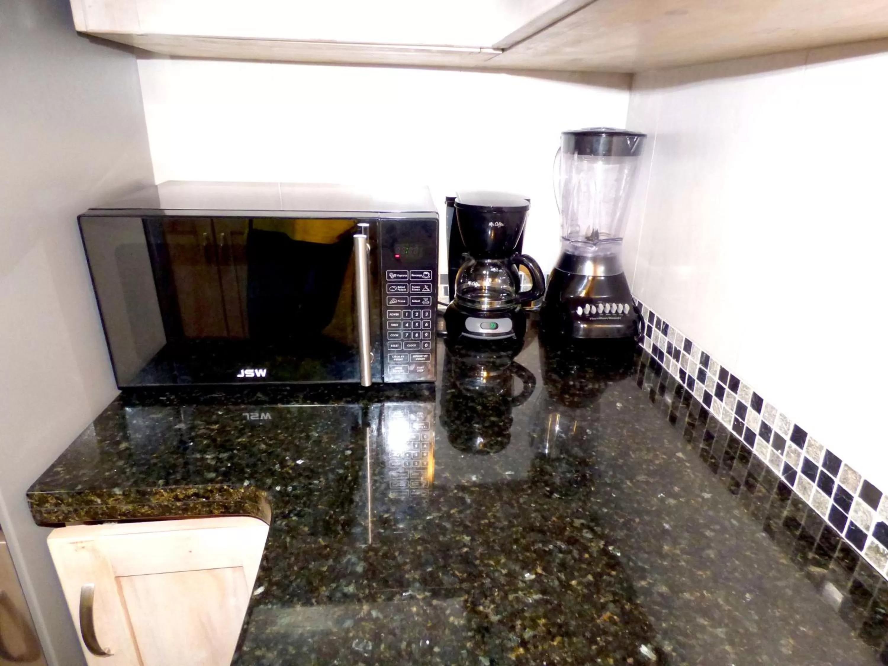 Kitchen or kitchenette in Beach One Bedroom Suite A22