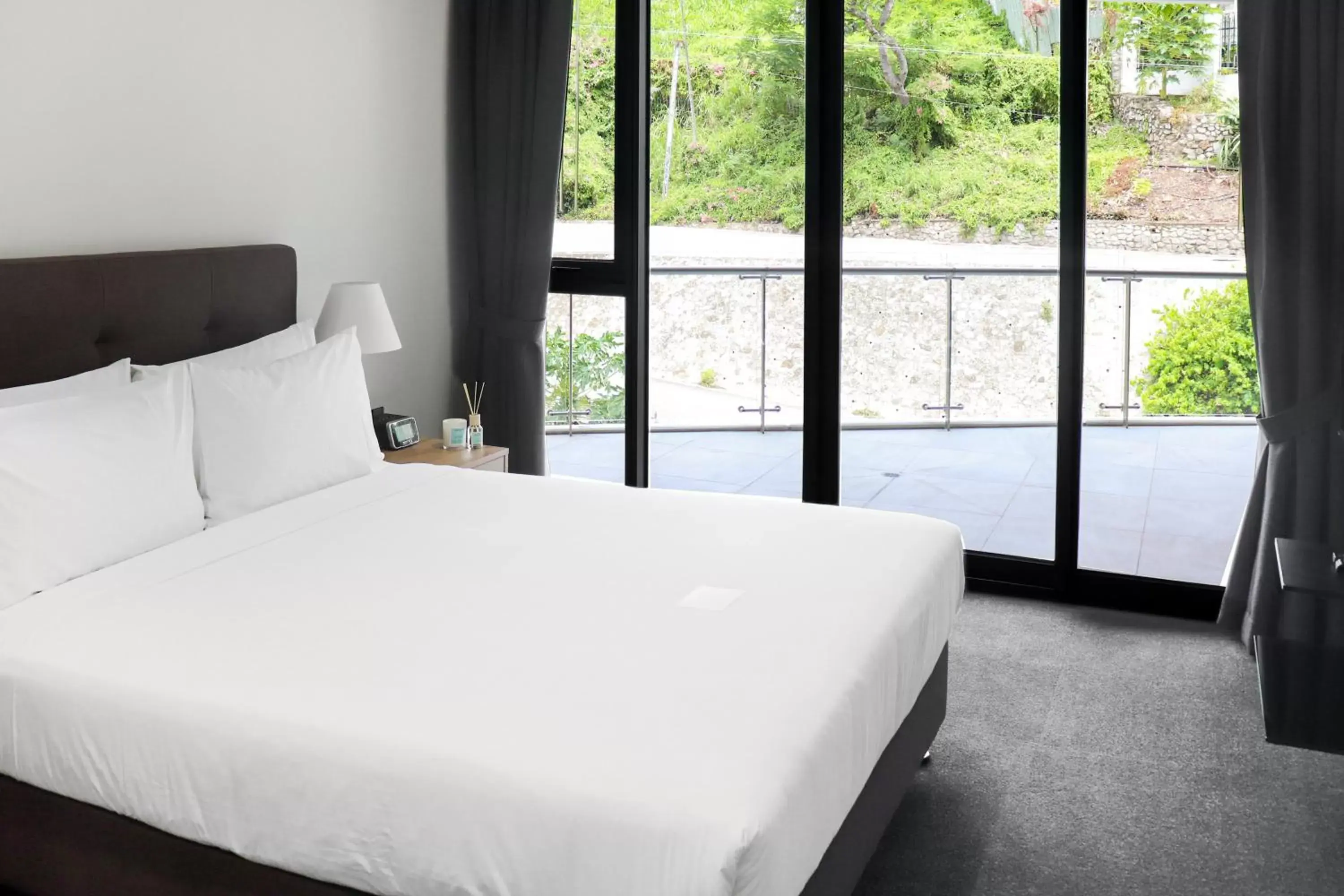 Photo of the whole room, Bed in Crowne Plaza Residences Port Moresby, an IHG Hotel