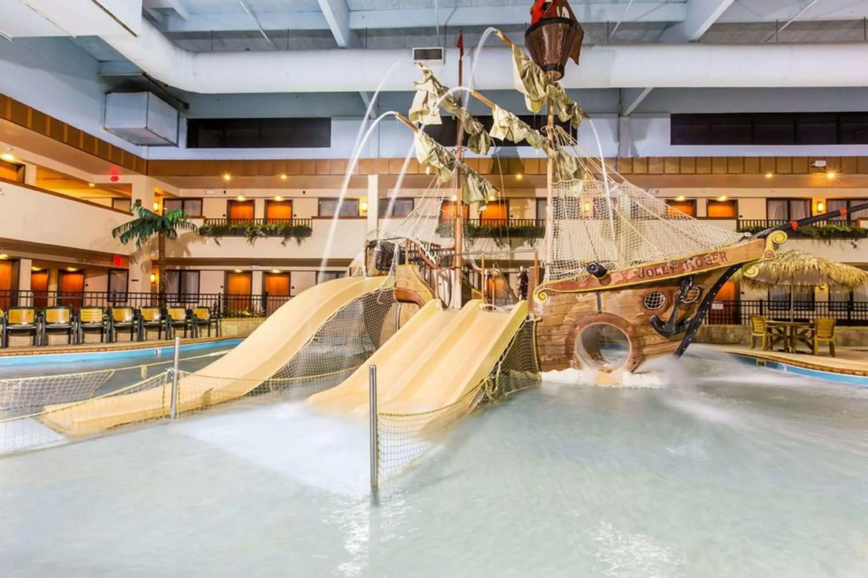 Swimming Pool in Ramada by Wyndham Sioux Falls Airport - Waterpark Resort & Event Center