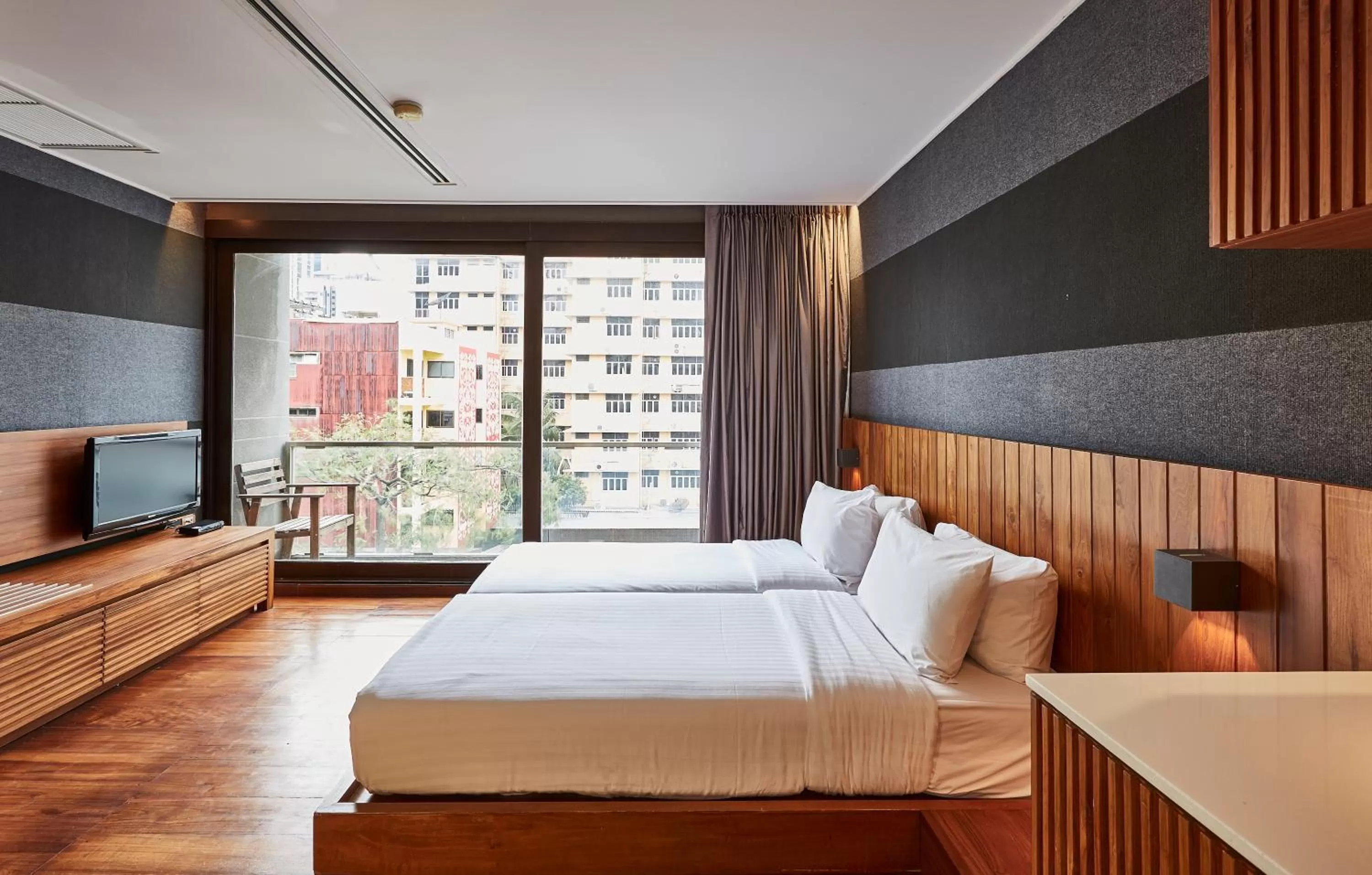 Bed in LUXX Langsuan Hotel - SHA Plus