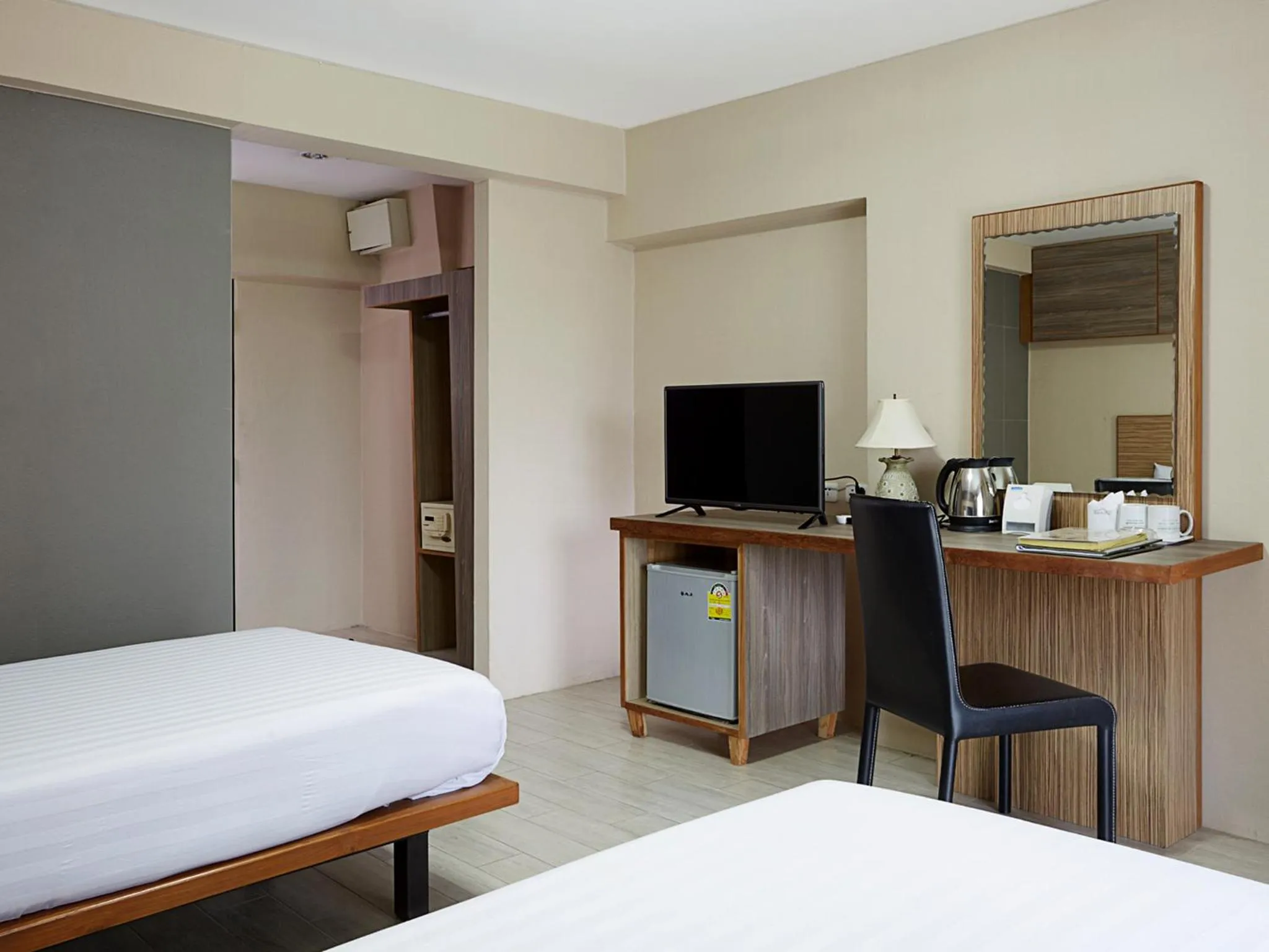 TV and multimedia, Bed in Watana Hotel