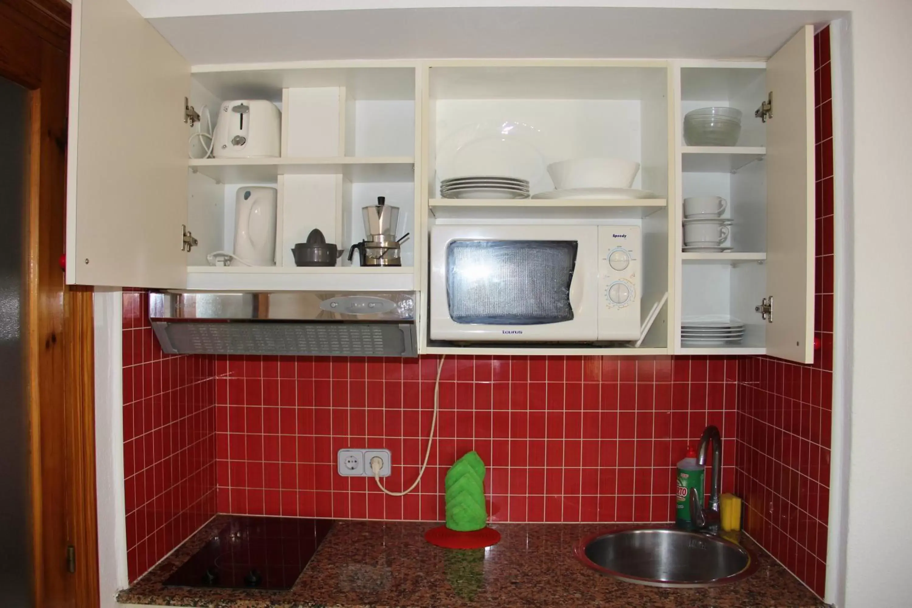 Kitchen or kitchenette in Apartamentos Royal Life