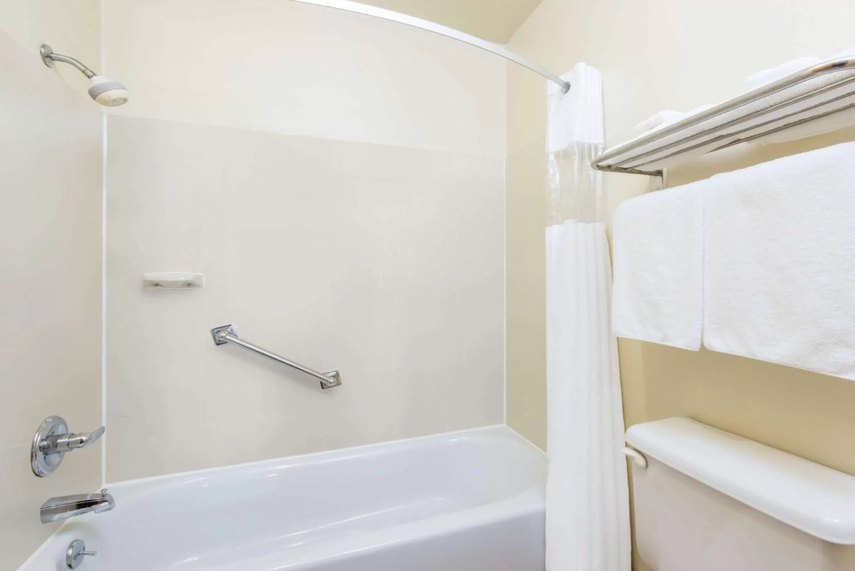 Bathroom in Days Inn & Suites by Wyndham Wichita