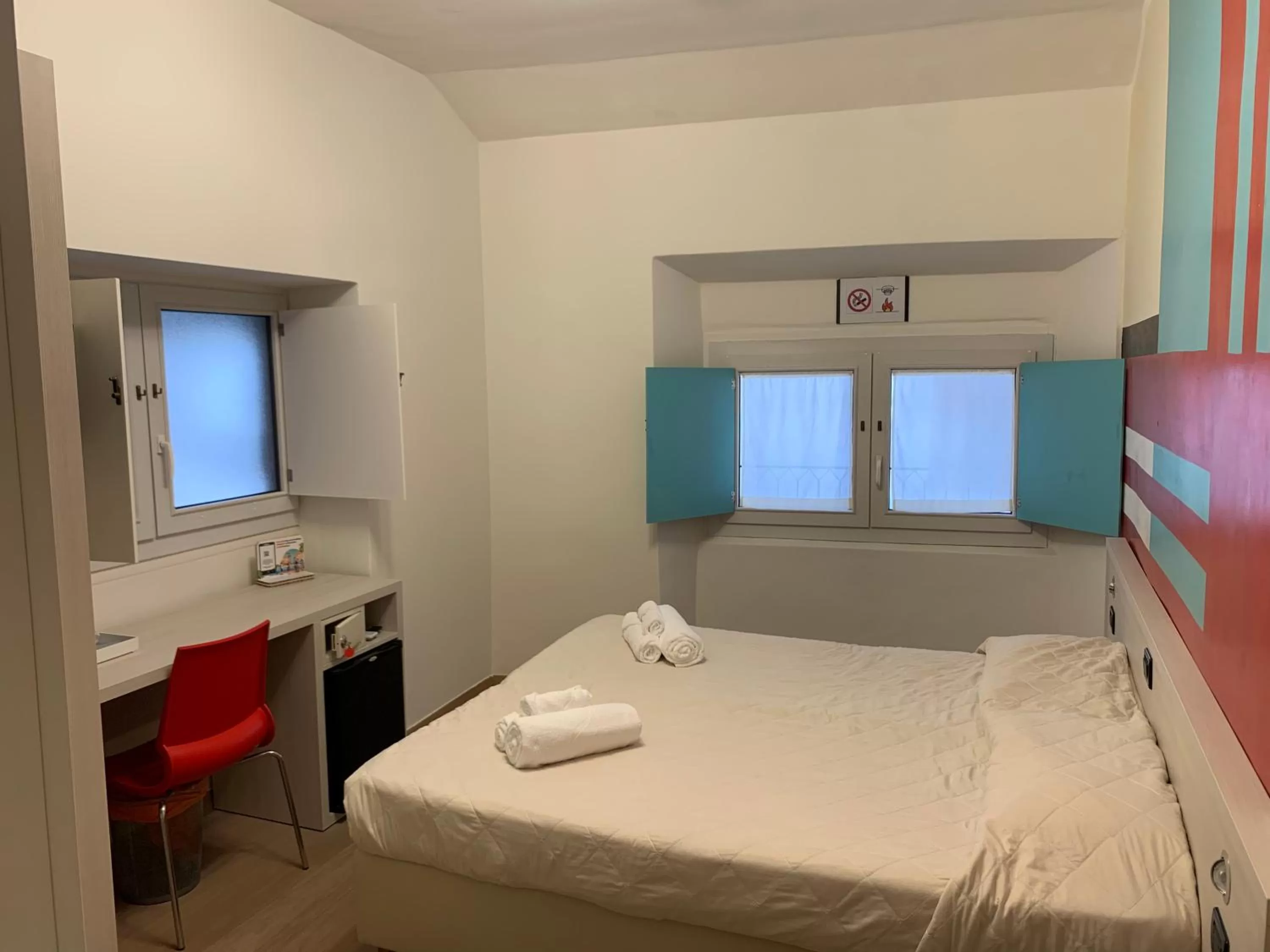 Bed in Hotel Cairoli