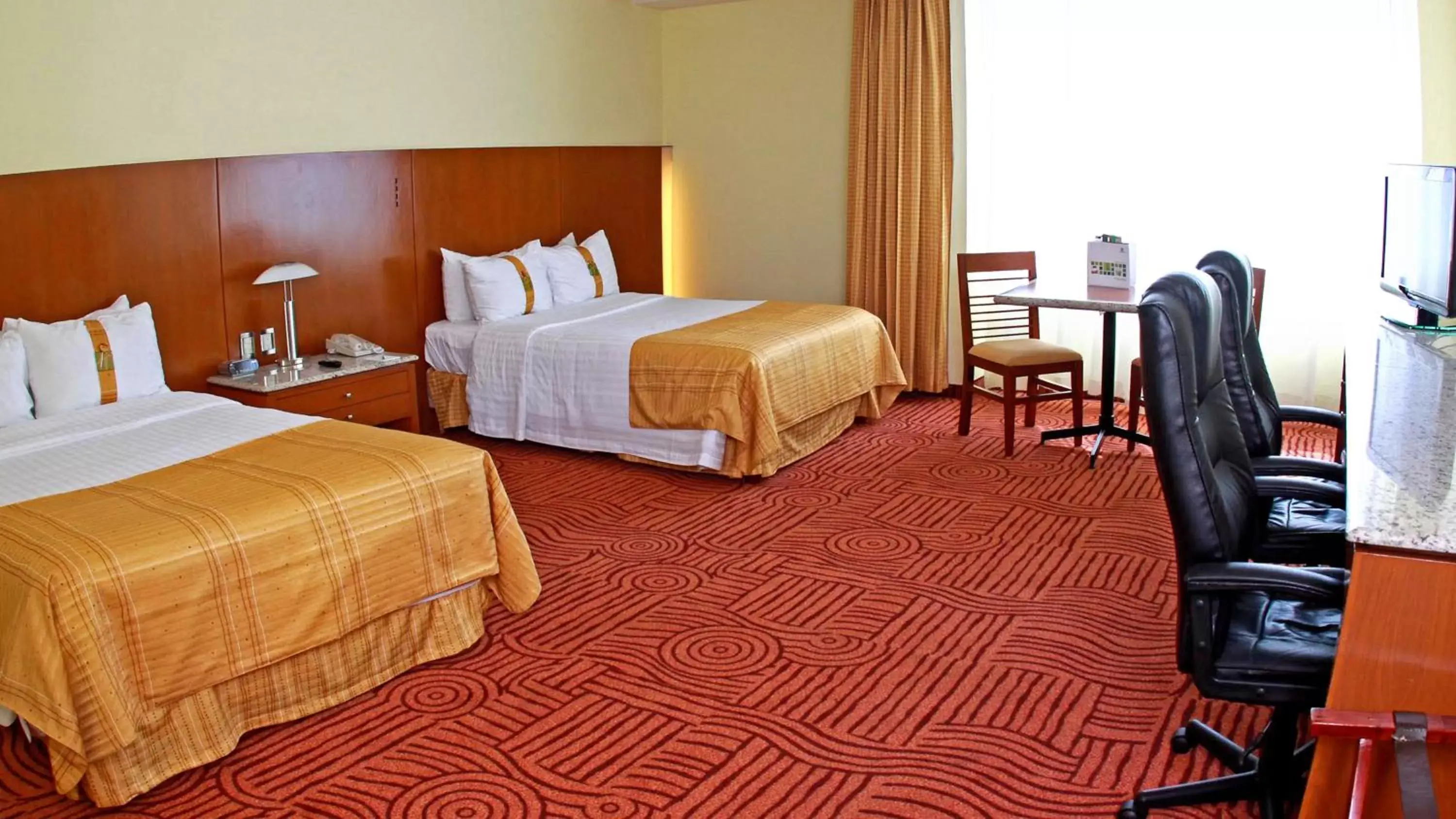 Photo of the whole room, Bed in Holiday Inn Puebla Finsa, an IHG Hotel
