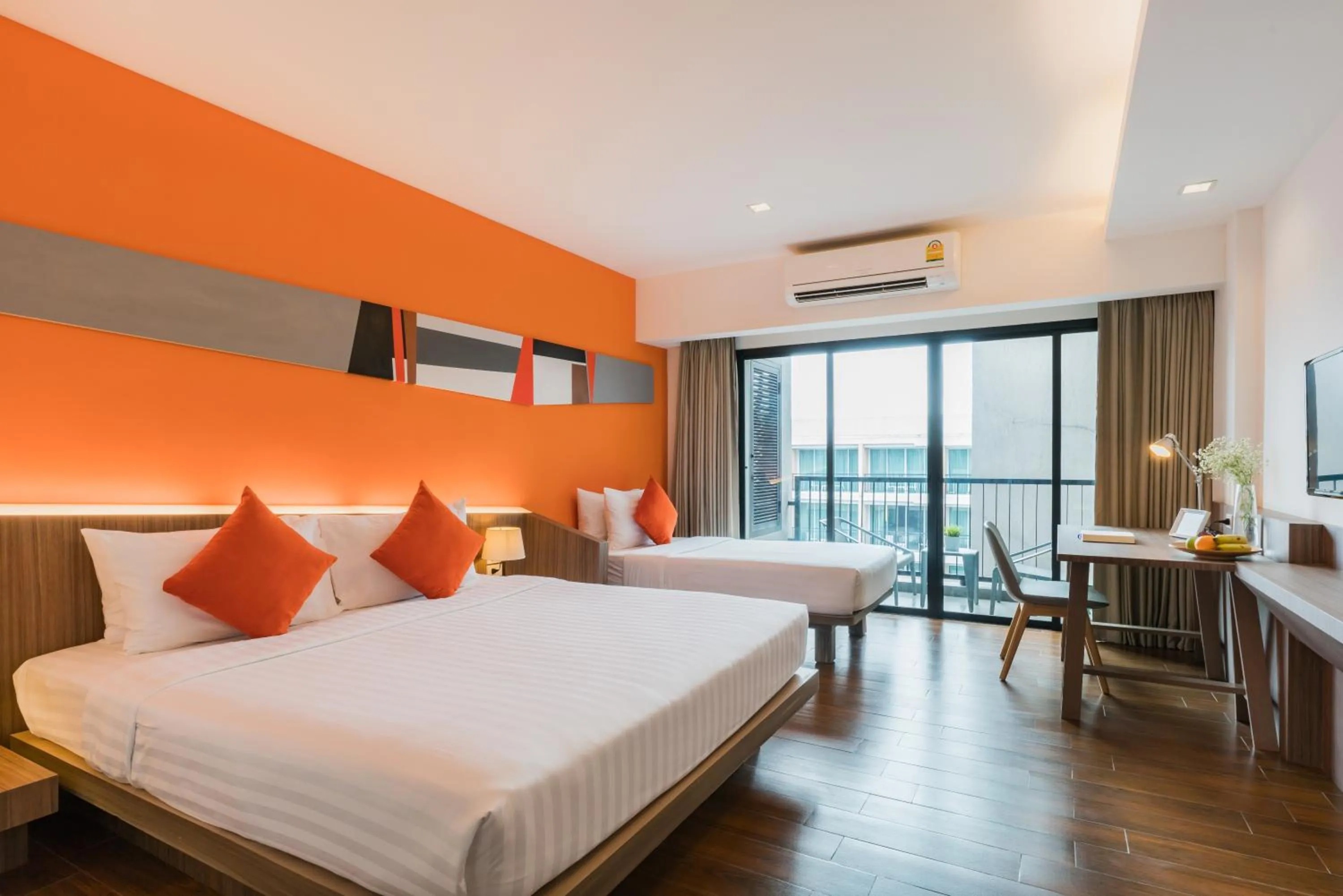Bed in J Inspired Hotel Pattaya