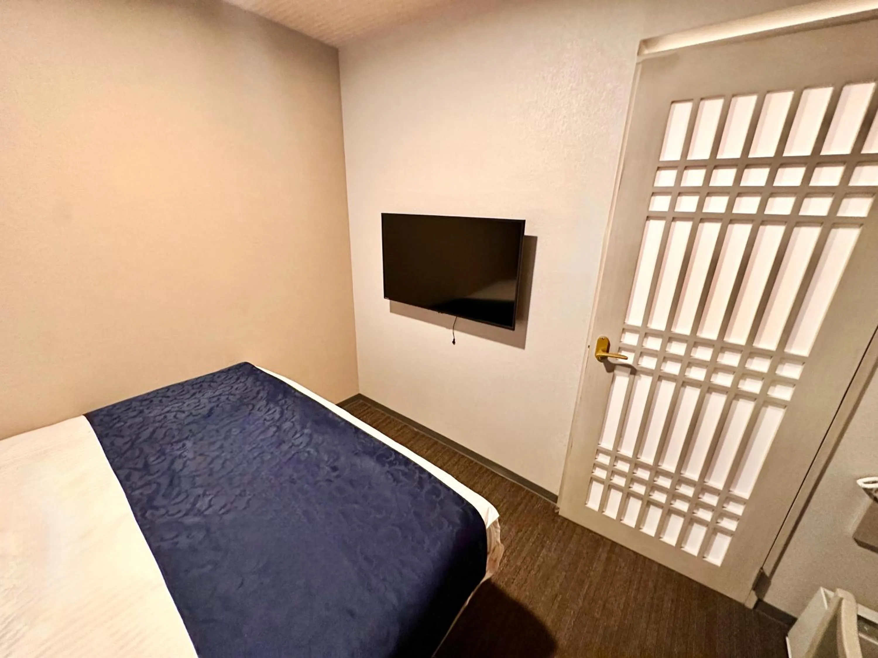 Bed in Hotel Rose Garden Shinjuku