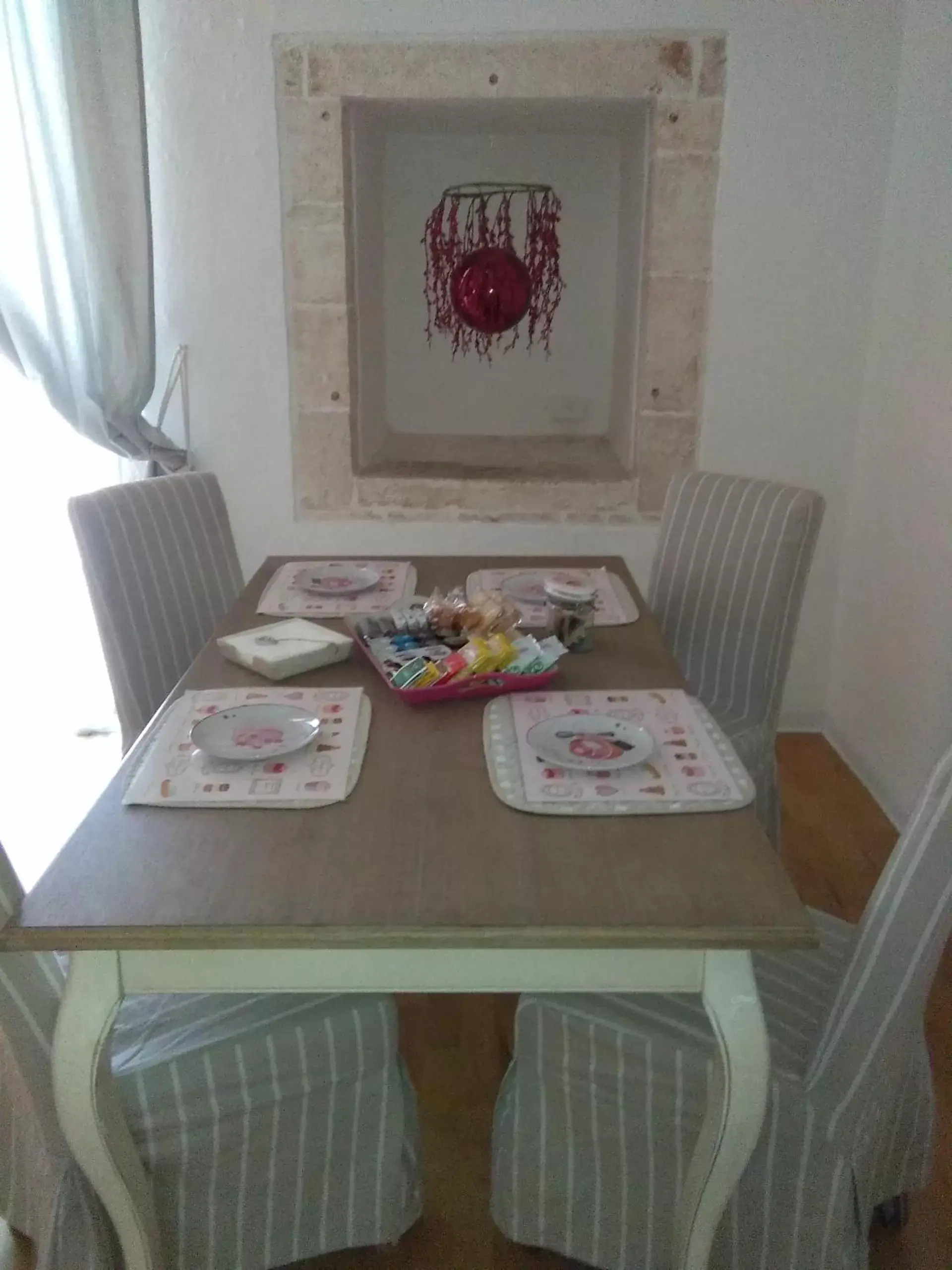 Dining Area in ARCOBELLO Suite Rooms