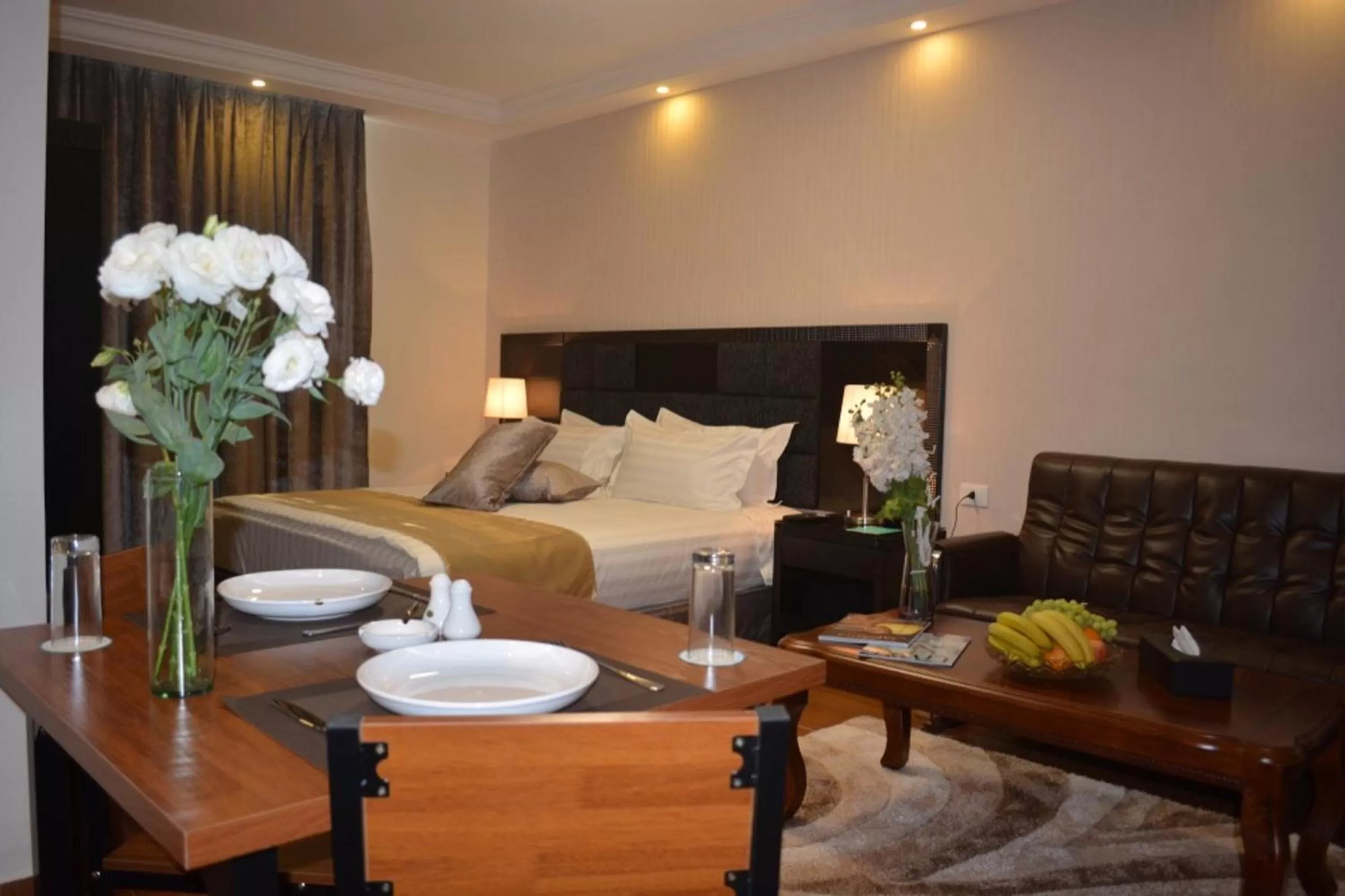 Photo of the whole room, Bed in Tilal Almadina Hotel & Suites