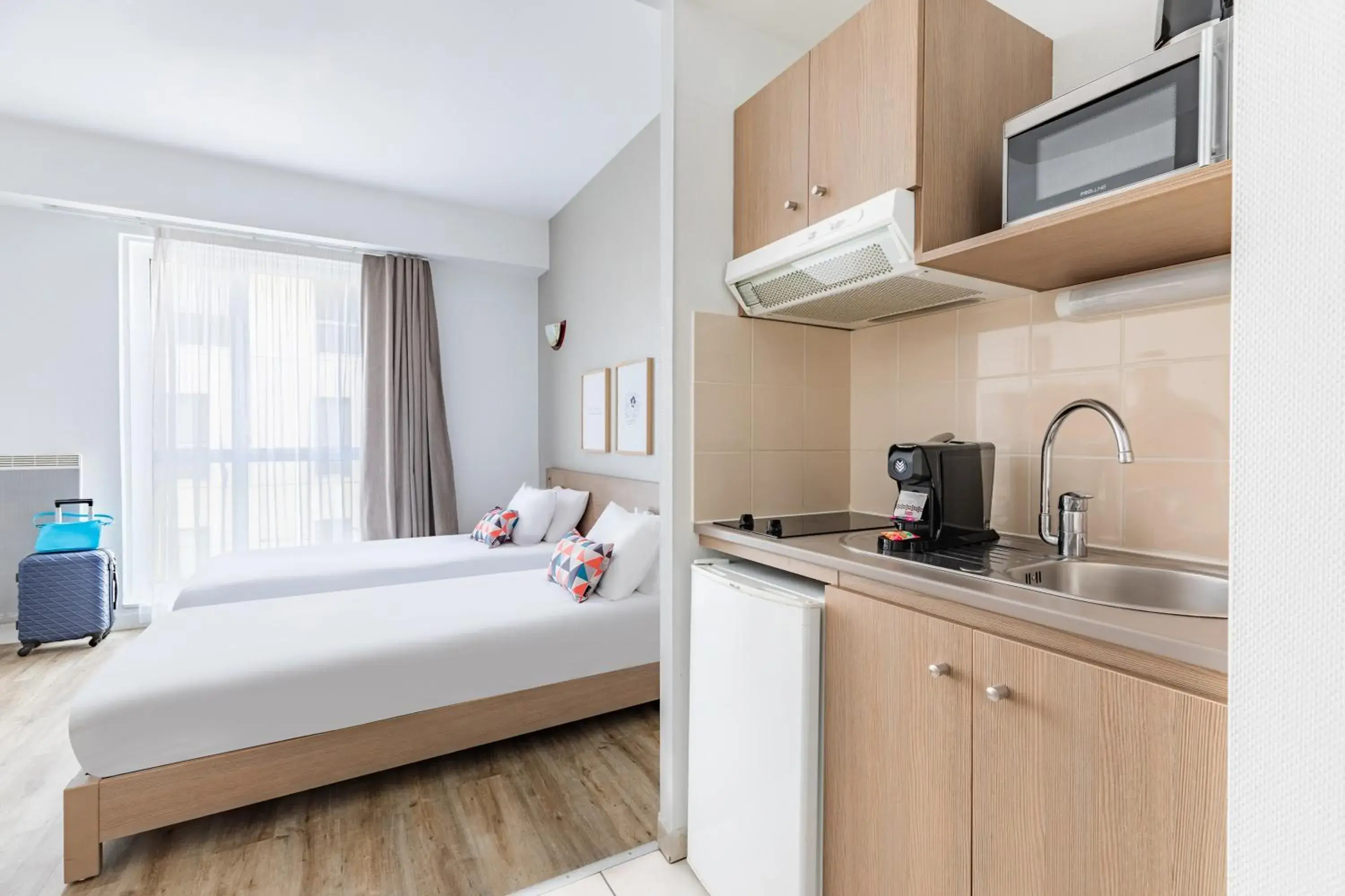 Bed in Appart'City Confort Le Mans Centre Bed in Appart'City Confort Le Mans Centre