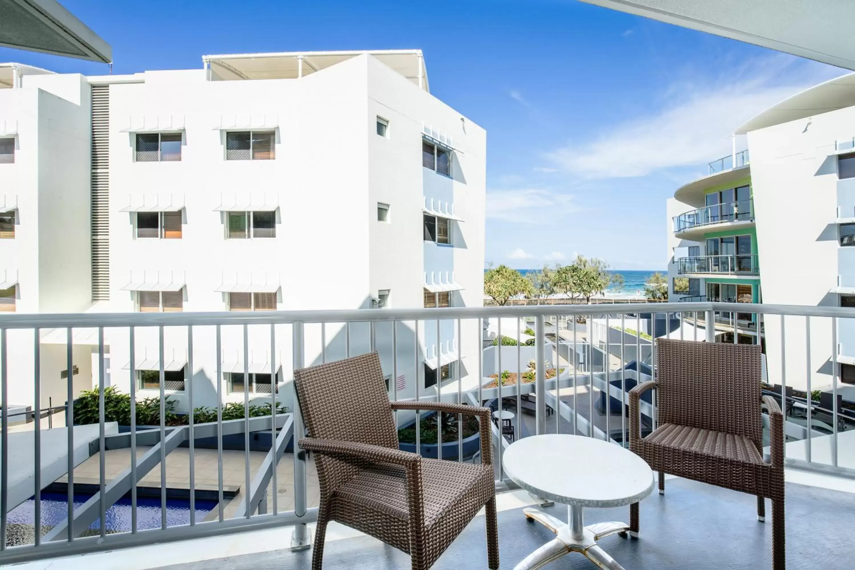 Balcony/Terrace, Pool View in Rolling Surf Resort