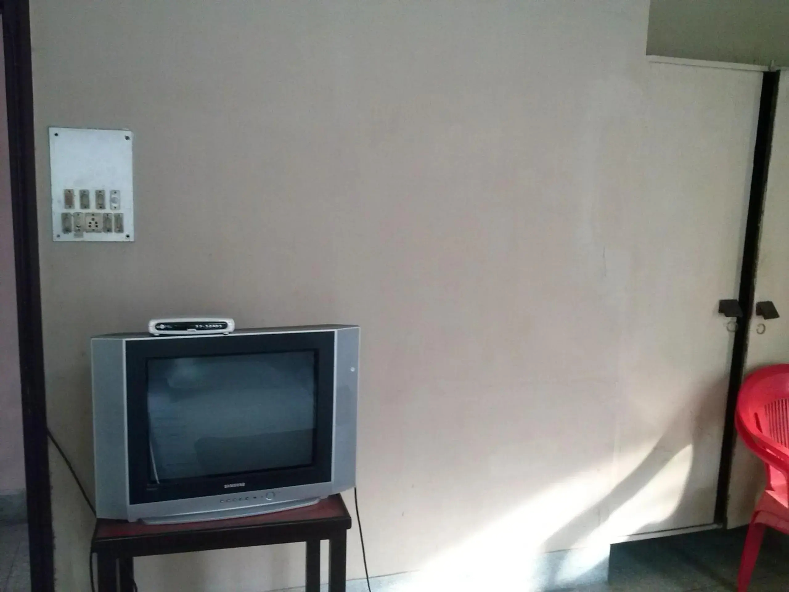 TV and multimedia, TV/Entertainment Center in Capital Guest House