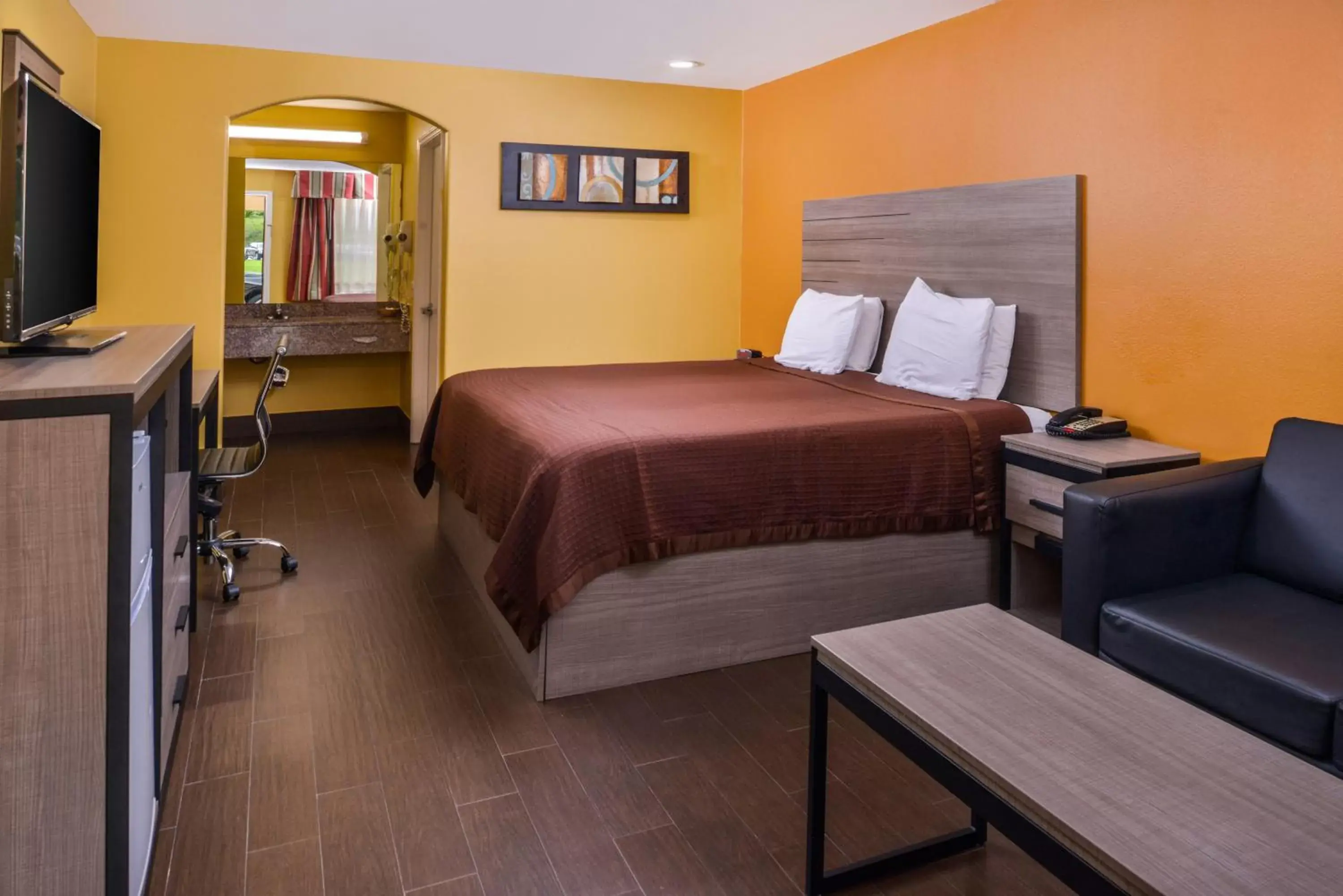 Bed in Americas Best Value Inn West Columbia