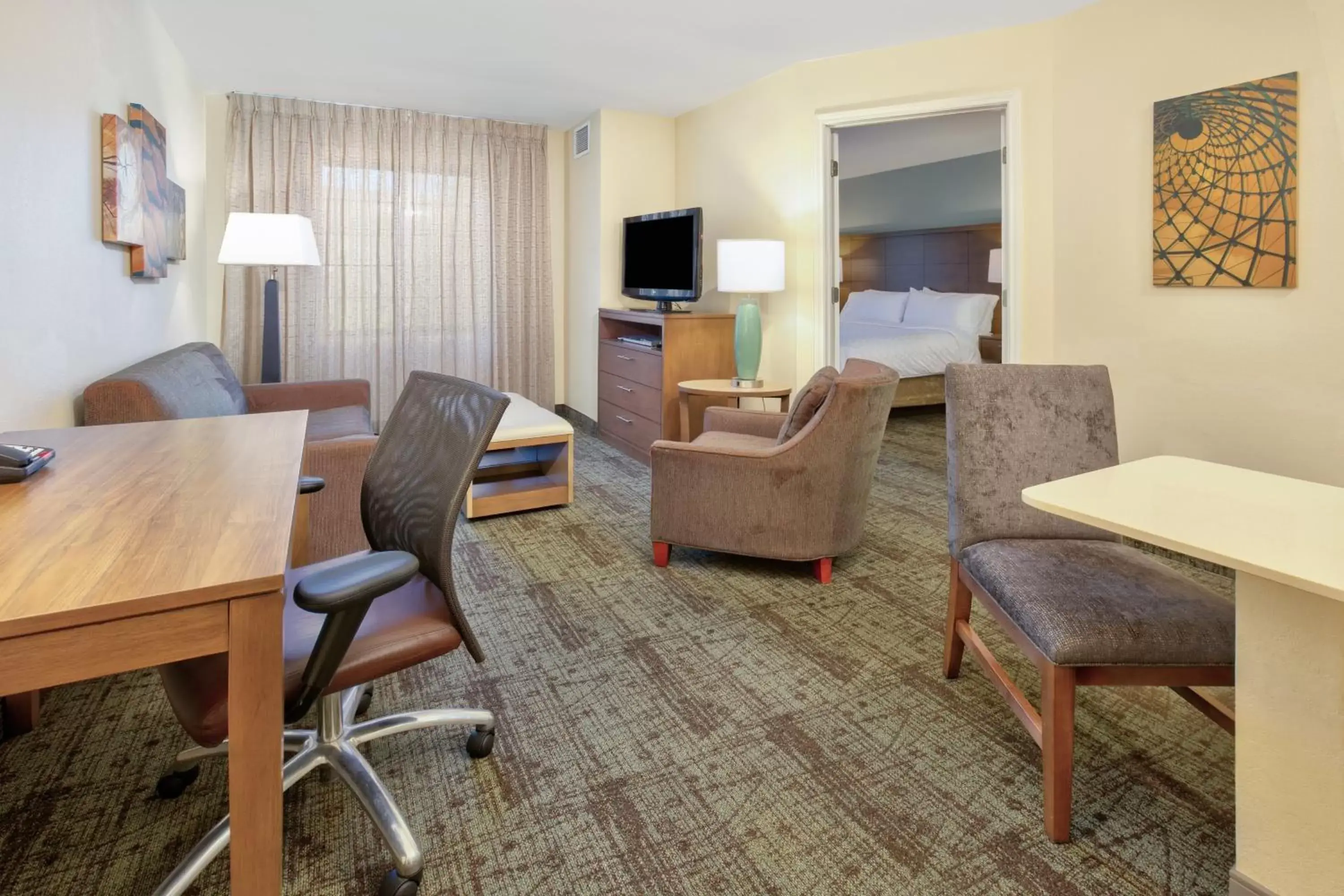 Bedroom, Seating Area in Staybridge Suites Corning, an IHG Hotel