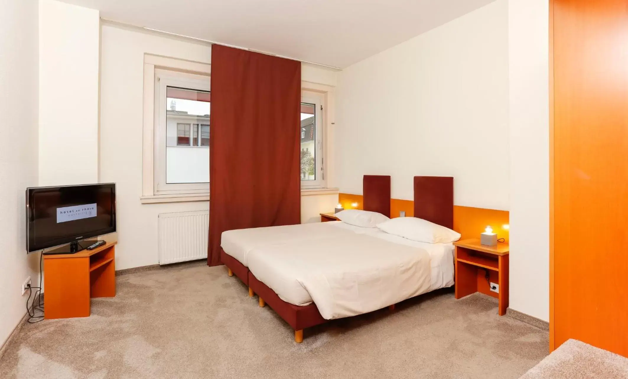Bed in Hotel am Rhein