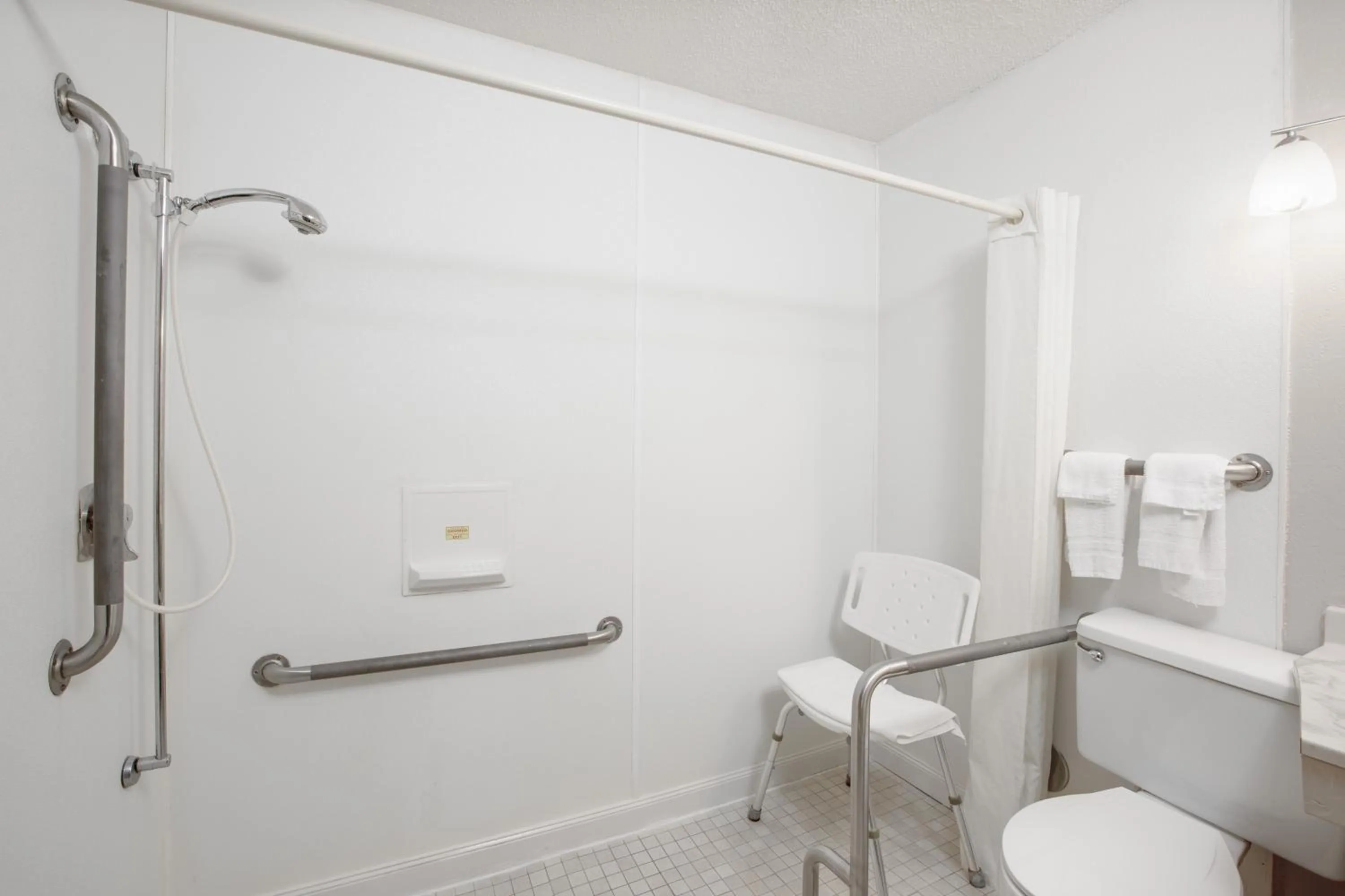 Bathroom in Super 8 by Wyndham Worthington Minnesota