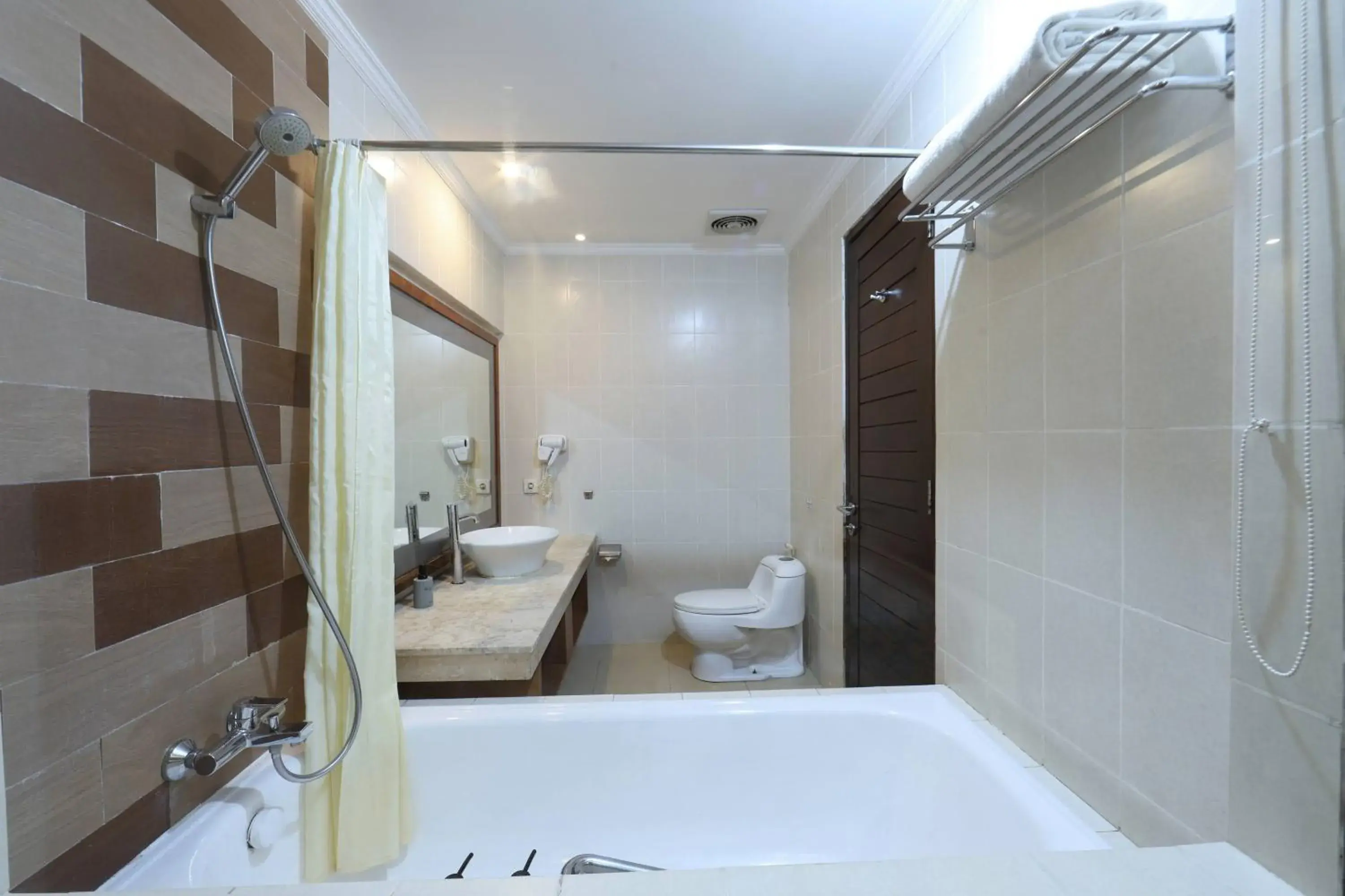 Bathroom in Adhi Jaya Hotel