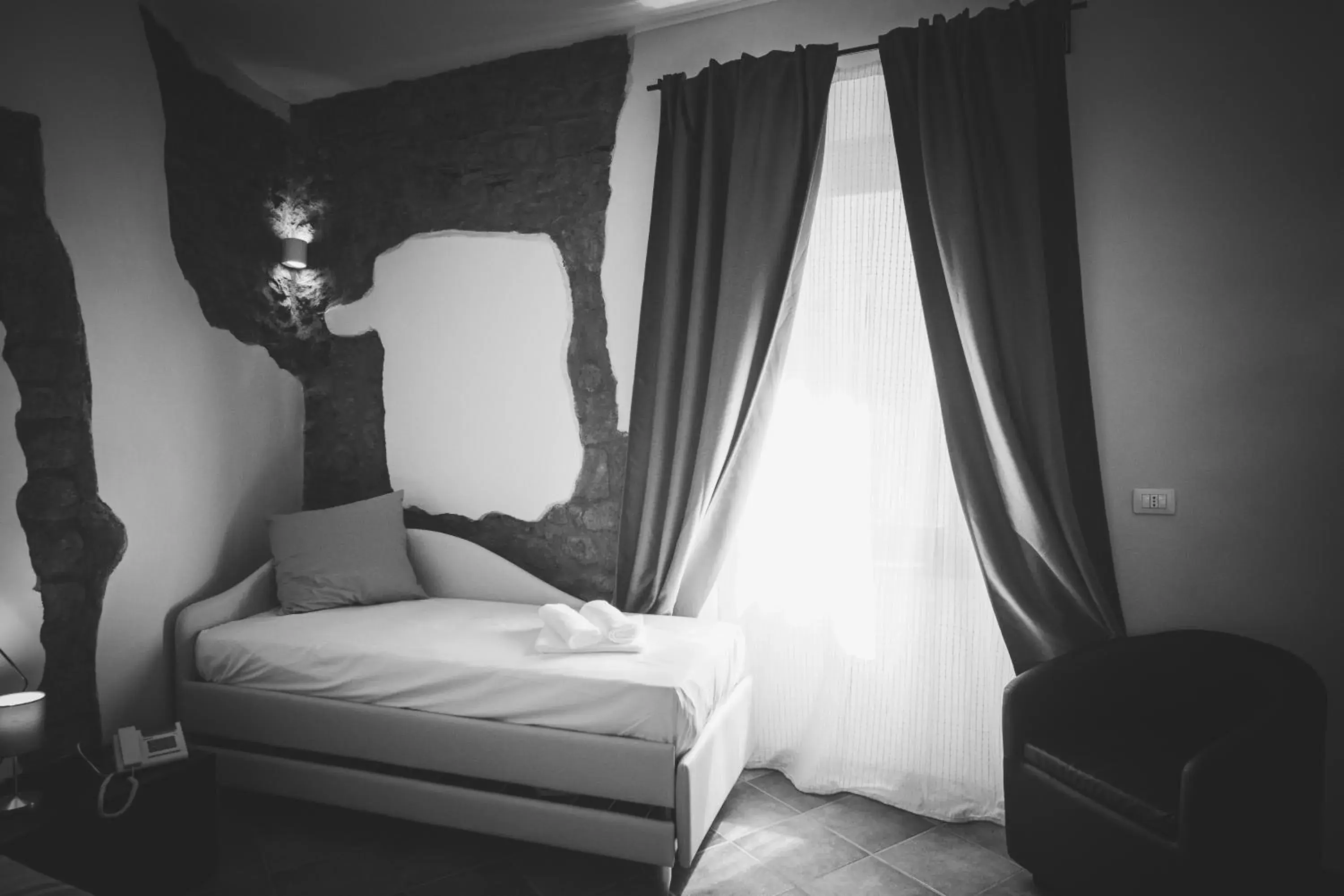 Bed in Le Undici Rose Hotel