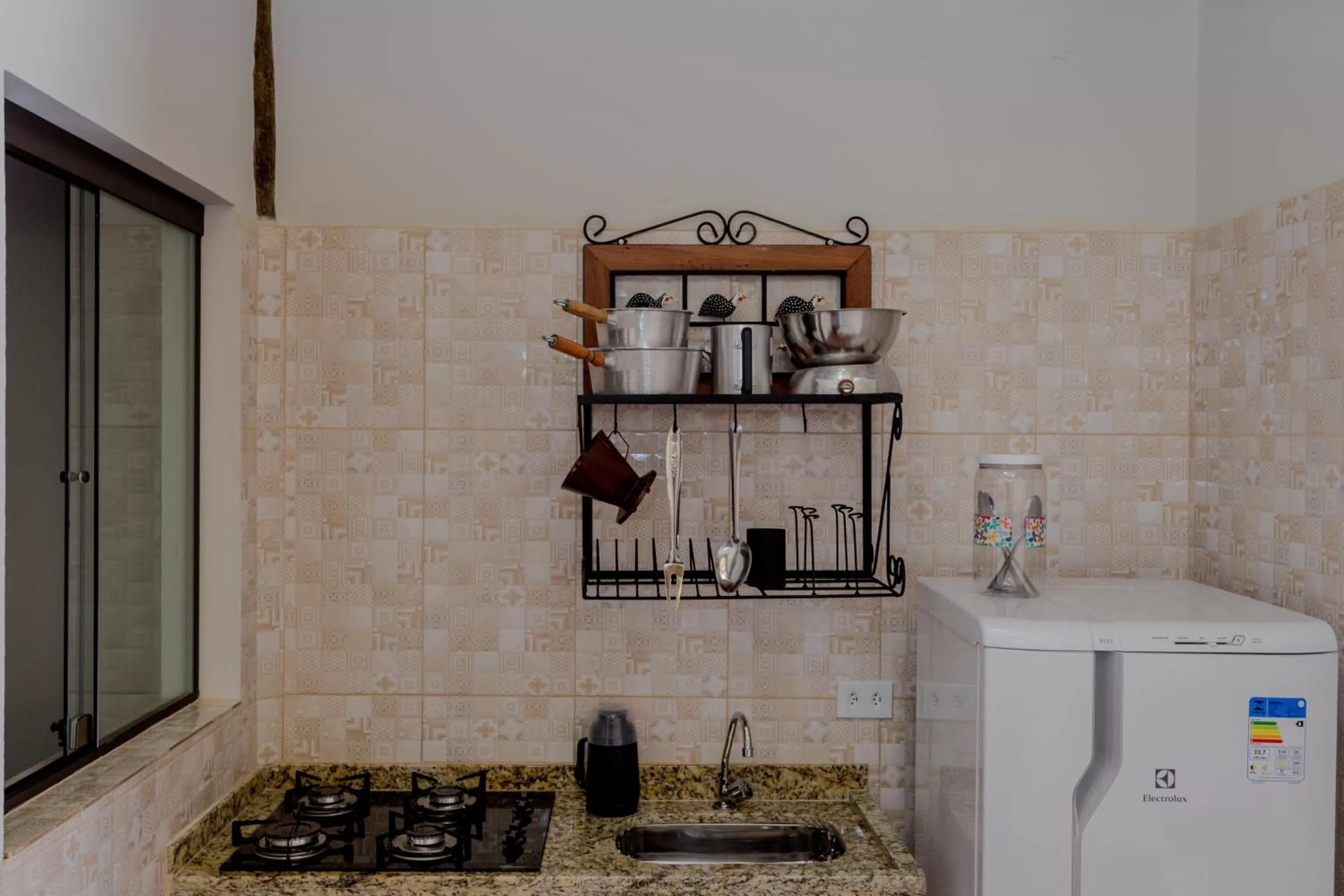 Kitchen or kitchenette in Pousada Chalés do Julião