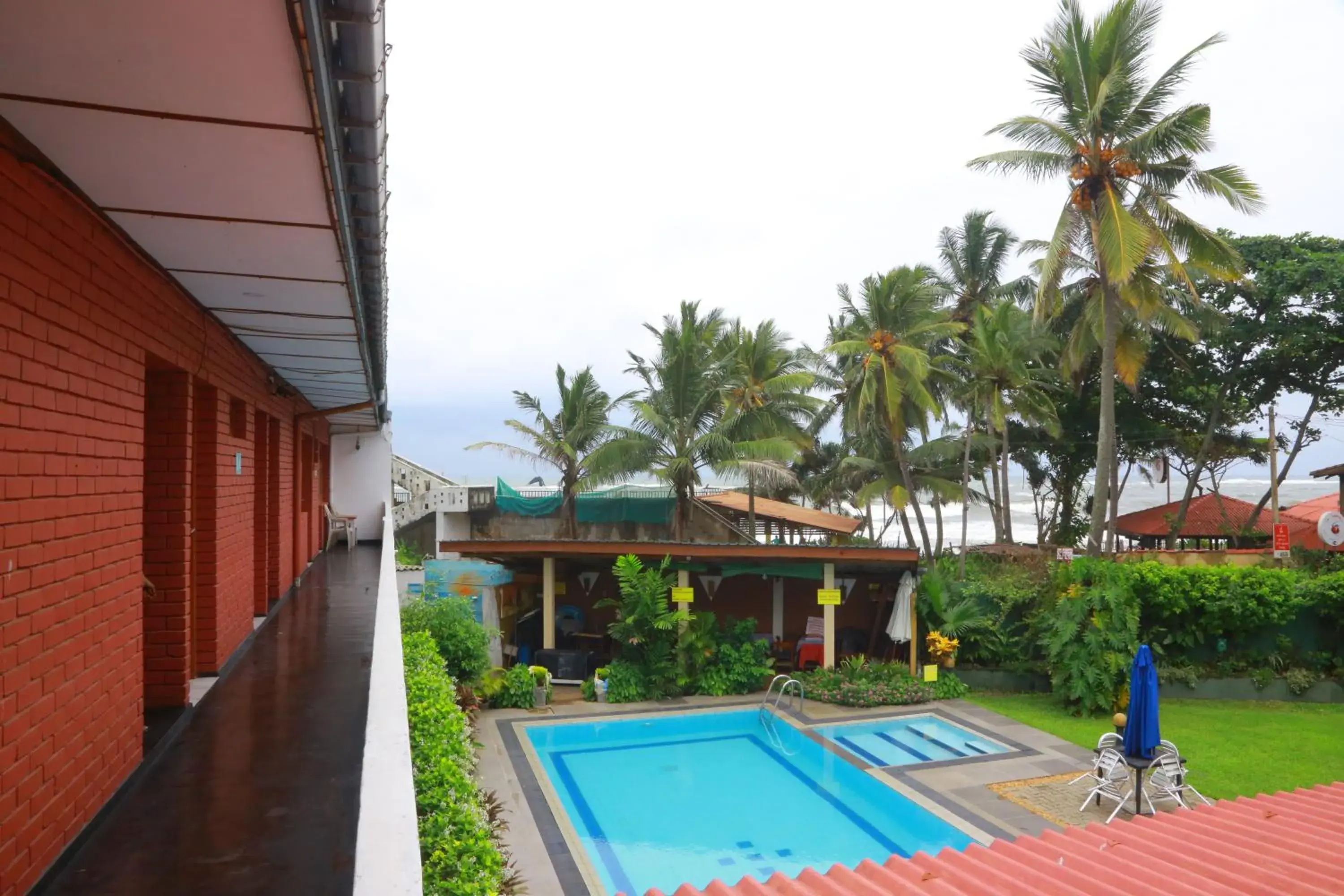 Balcony/Terrace, Swimming Pool in Ranveli Beach Resort