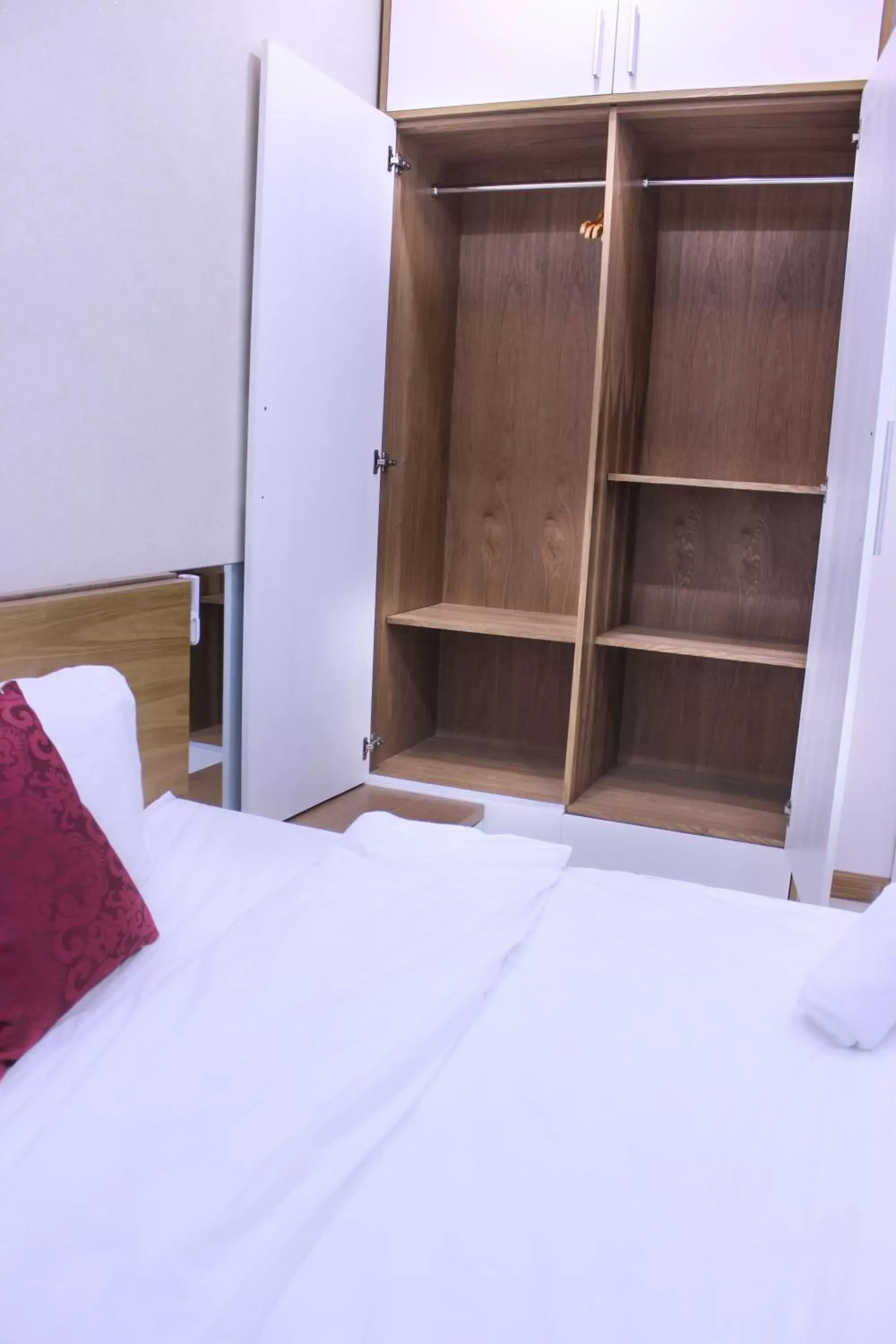 wardrobe, Bed in Gold Ocean Apartment